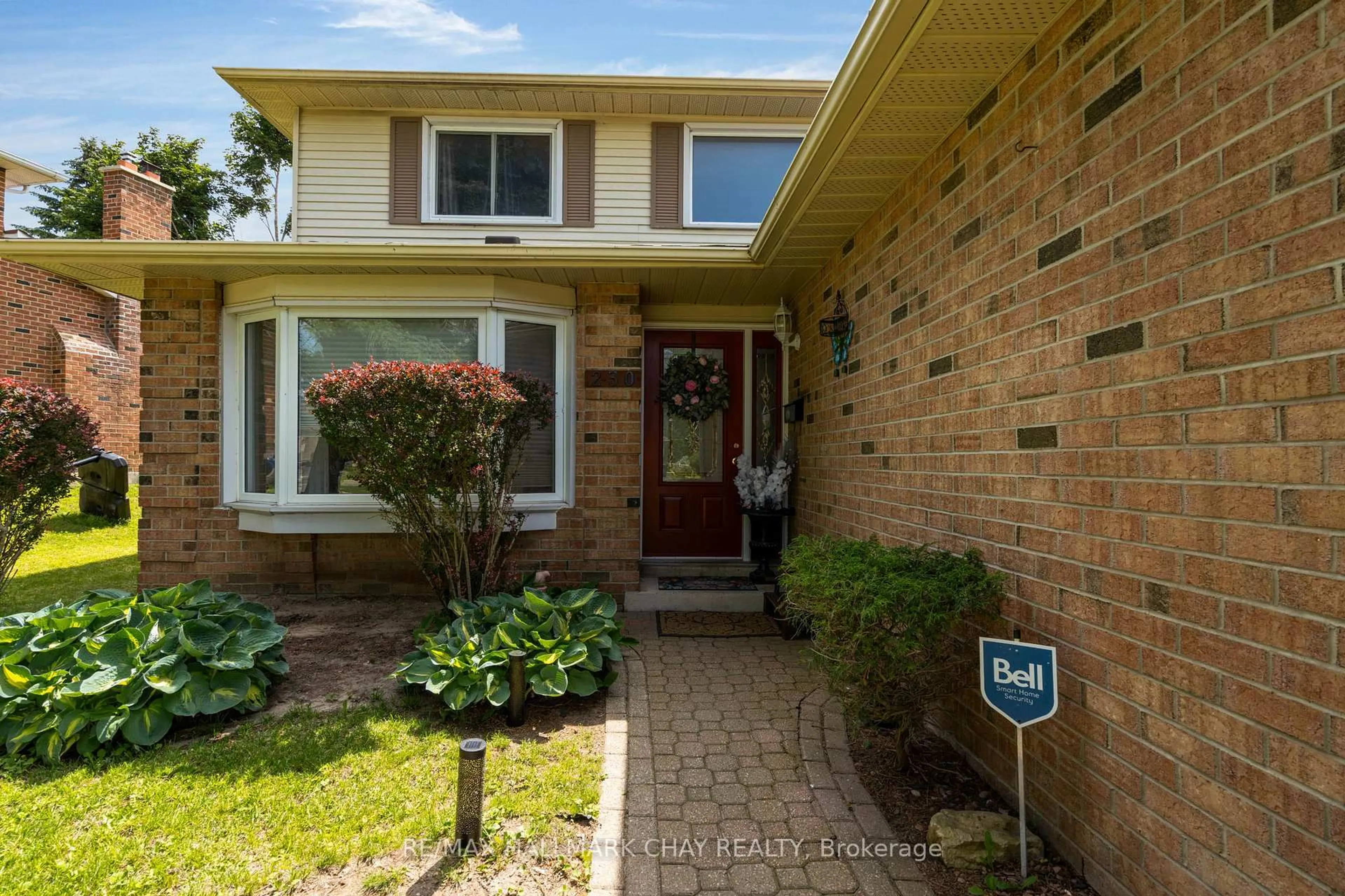 Home with brick exterior material, street for 230 Browning Tr, Barrie Ontario L4N 5J7