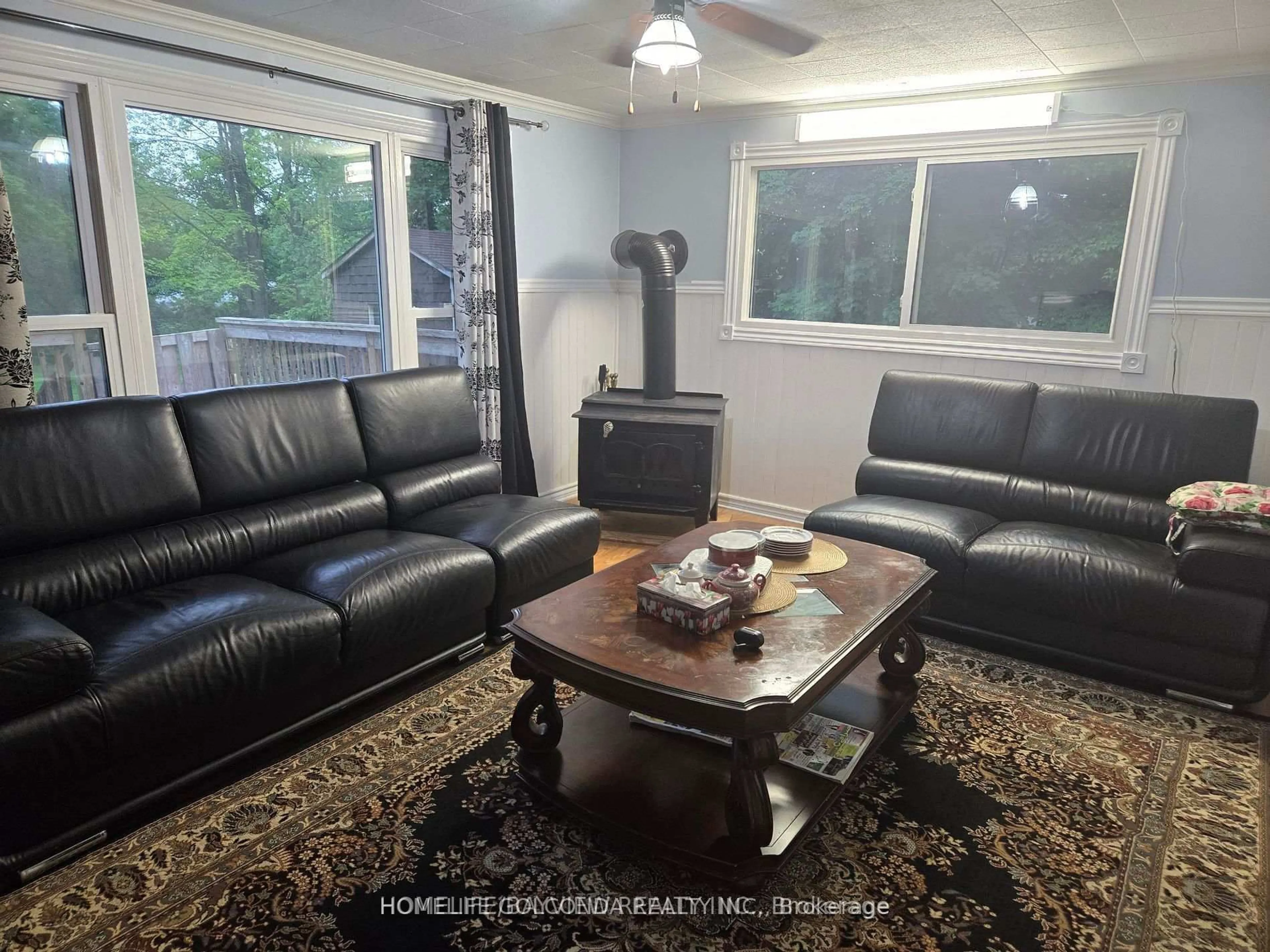 Living room with furniture, unknown for 15 Poplar Cres, Oro-Medonte Ontario L0L 1T0