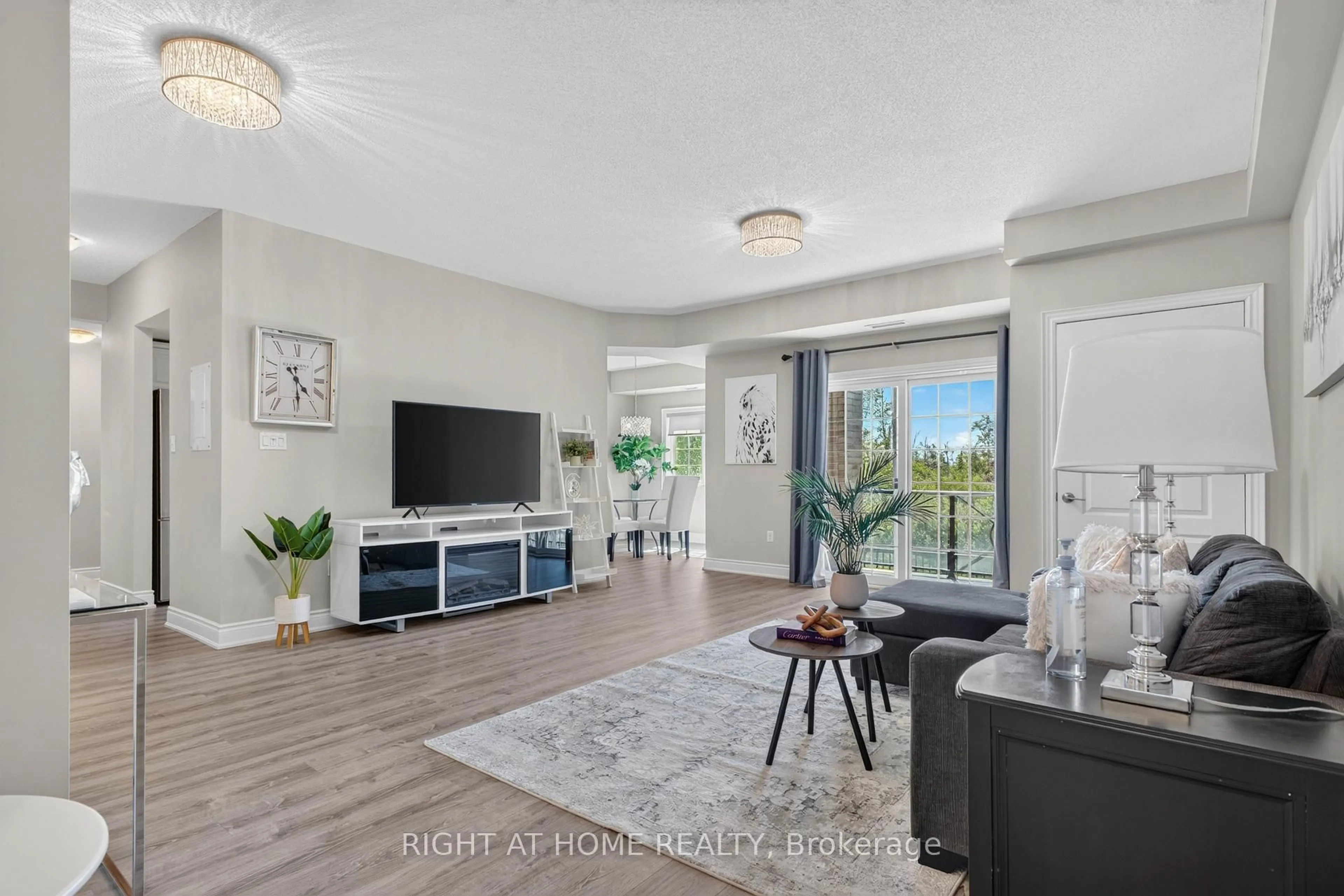 Living room with furniture, unknown for 42 Ferndale Dr #111, Barrie Ontario L4N 2M5