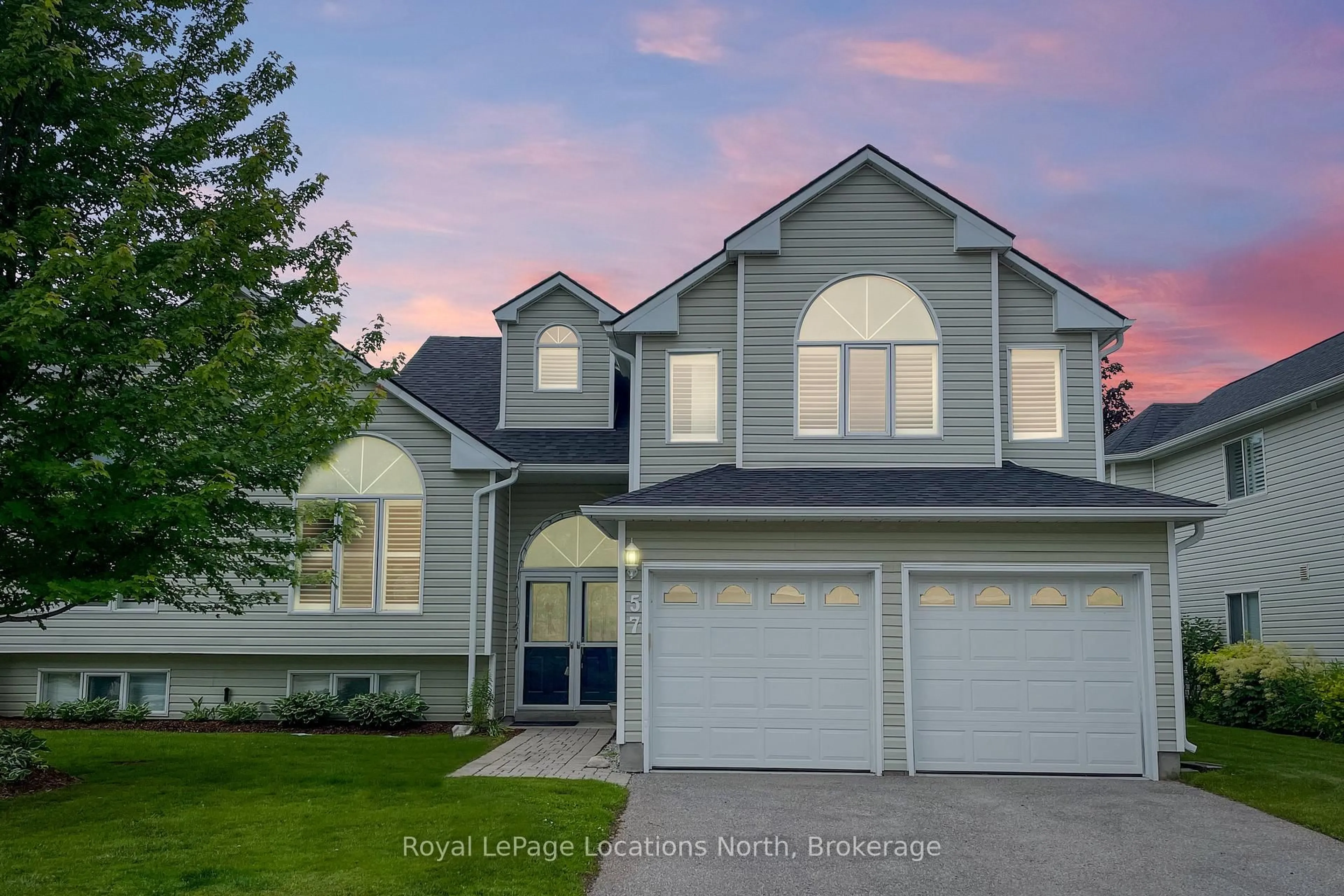 Home with vinyl exterior material, street for 57 Barker Blvd, Collingwood Ontario L9Y 4W4
