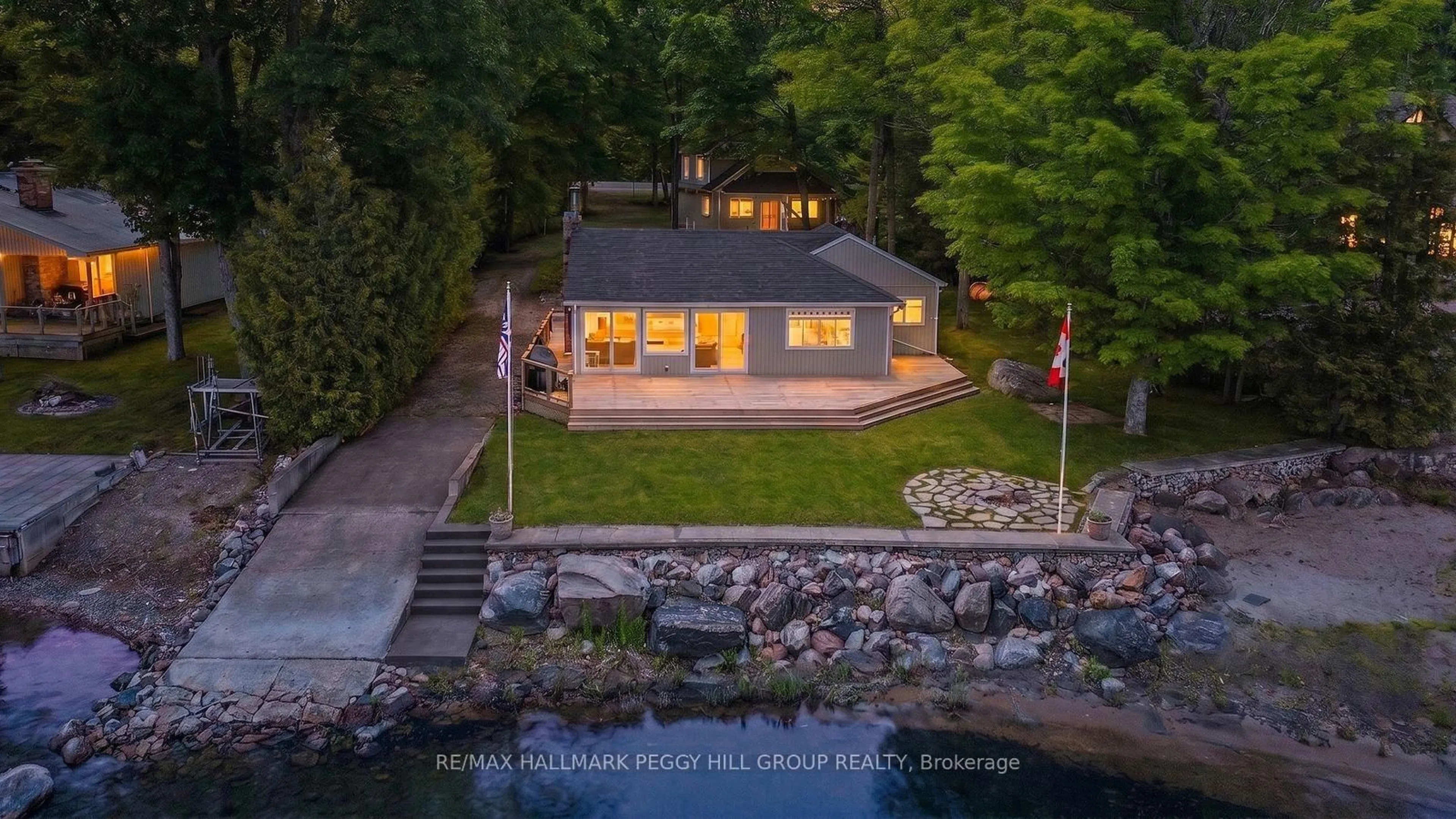 A pic from outside/outdoor area/front of a property/back of a property/a pic from drone, water/lake/river/ocean view for 1449 Champlain Rd, Tiny Ontario L9M 0C1