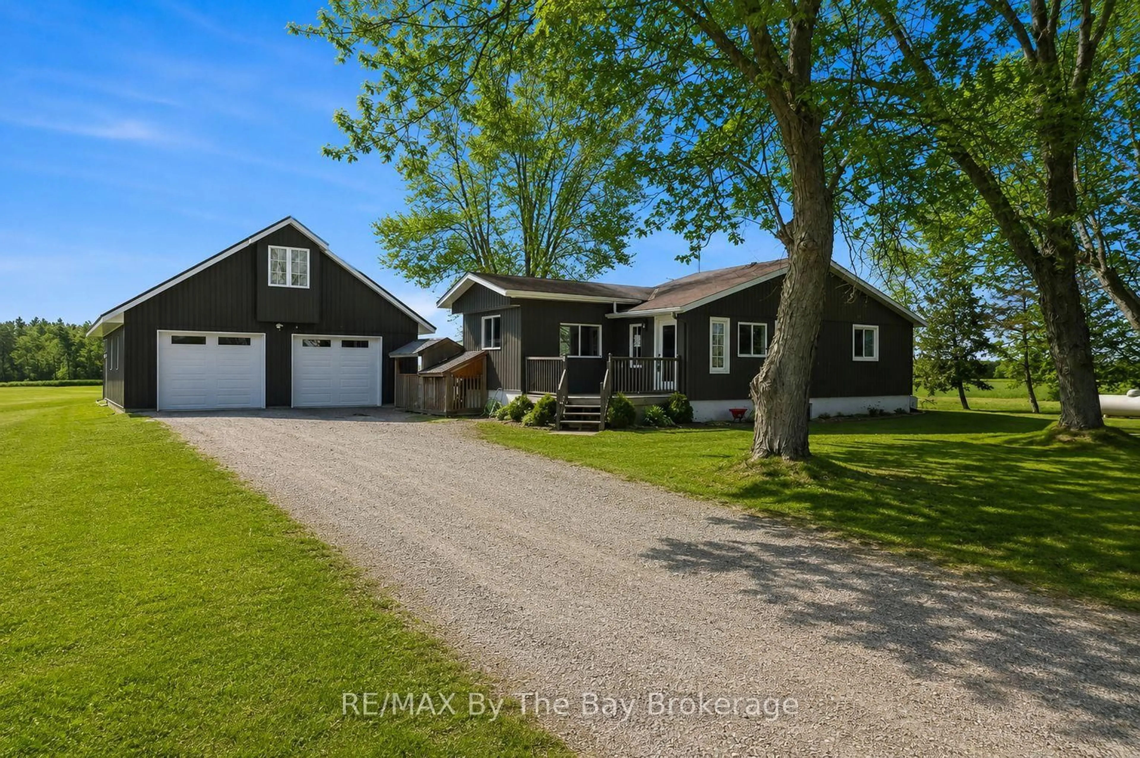 A pic from outside/outdoor area/front of a property/back of a property/a pic from drone, street for 2533 Flos 3 Rd, Springwater Ontario L0L 2K0