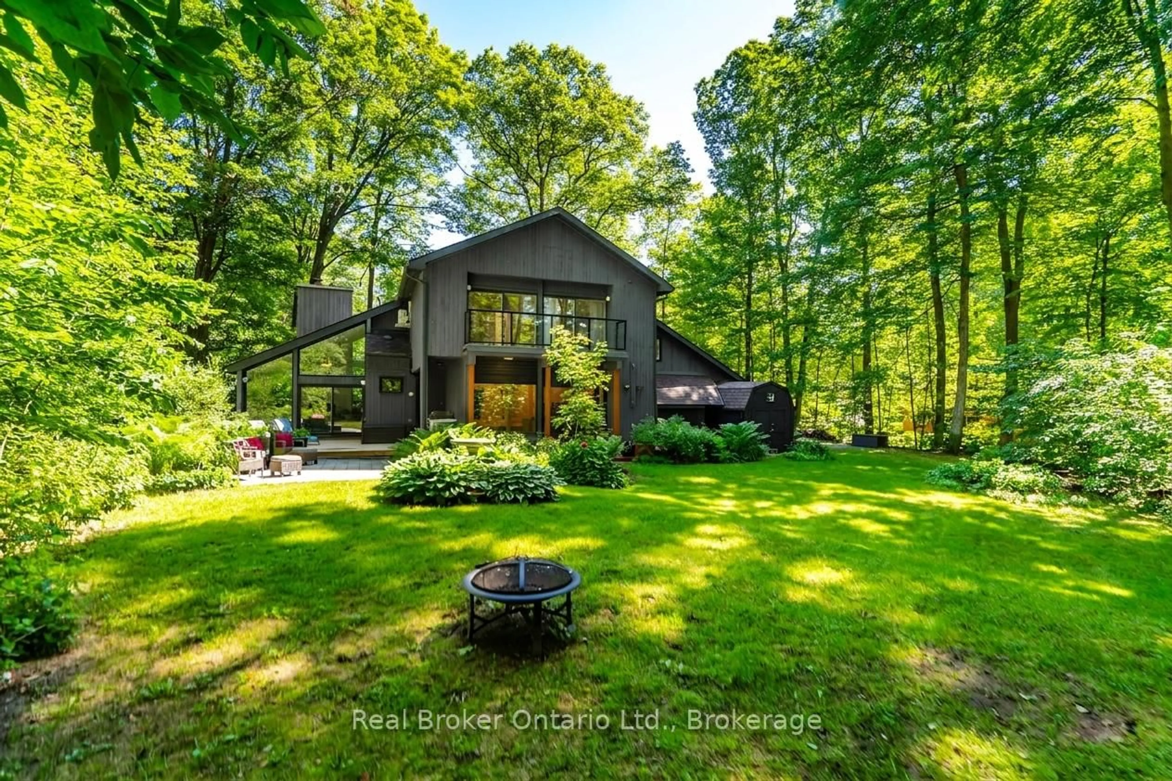 A pic from outside/outdoor area/front of a property/back of a property/a pic from drone, forest/trees view for 841 Portage Park Lane, Midland Ontario L4R 5G3
