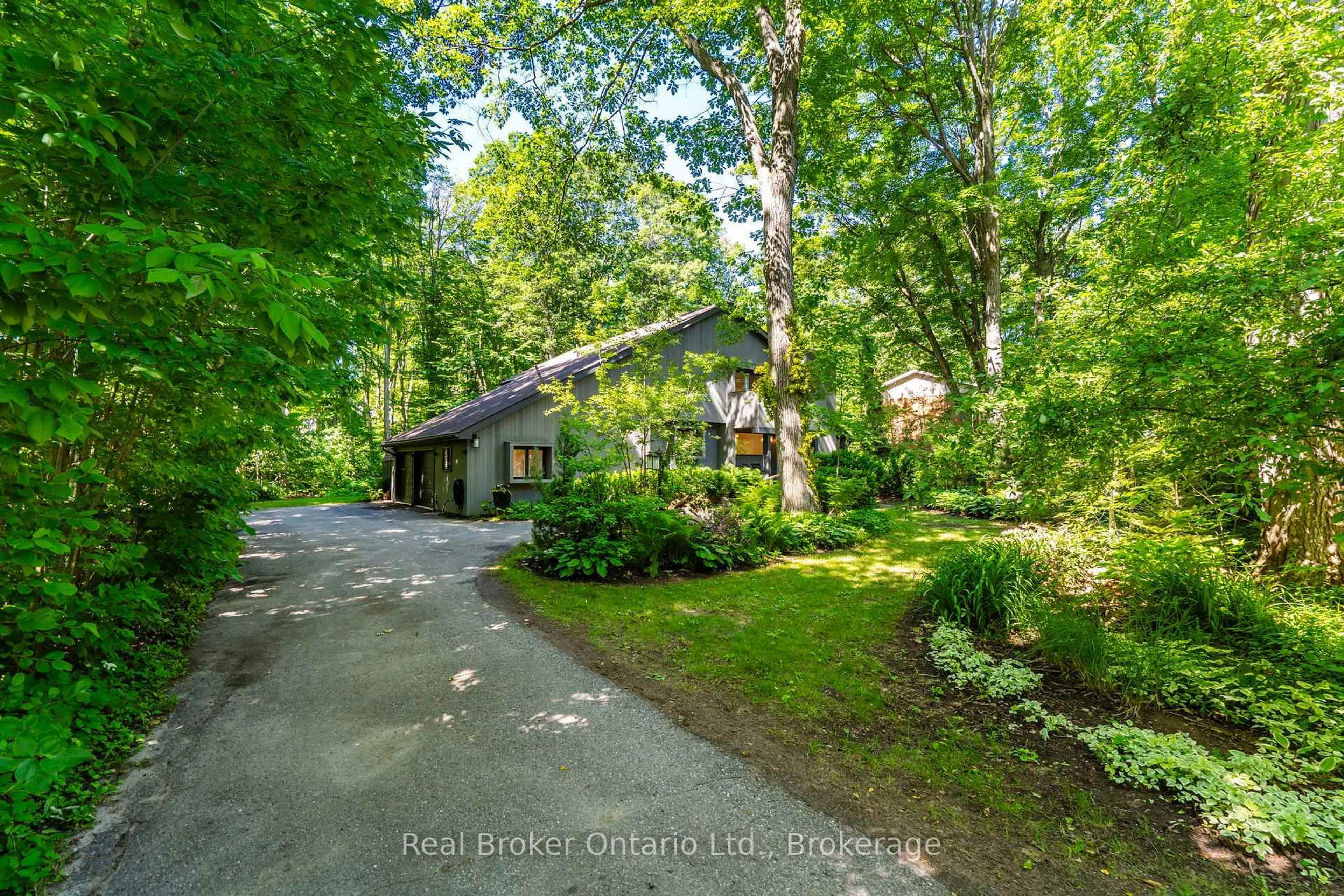 A pic from outside/outdoor area/front of a property/back of a property/a pic from drone, forest/trees view for 841 Portage Park Lane, Midland Ontario L4R 5G3