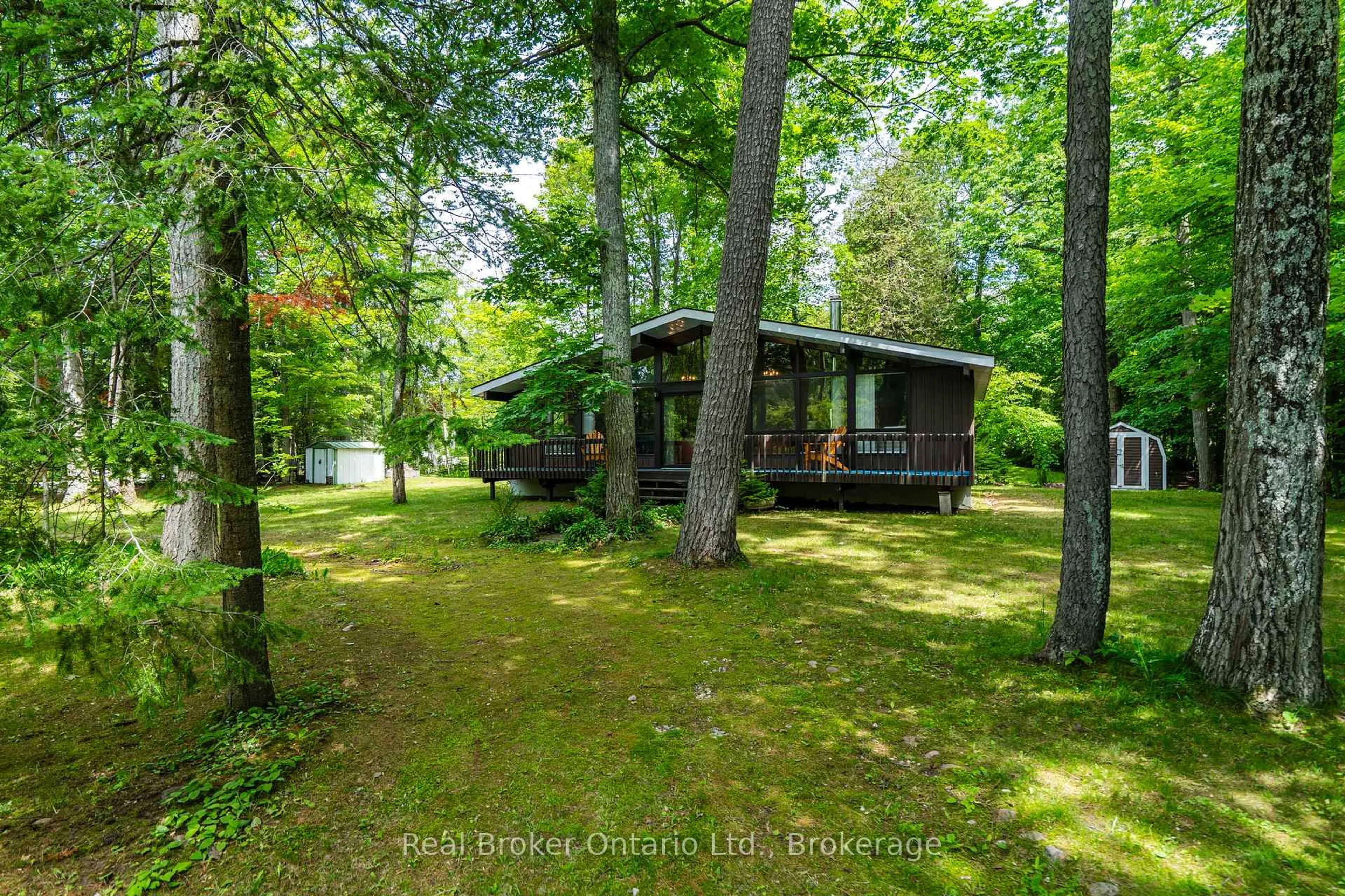 A pic from outside/outdoor area/front of a property/back of a property/a pic from drone, forest/trees view for 59 Marchand Rd, Tiny Ontario L9M 1R3