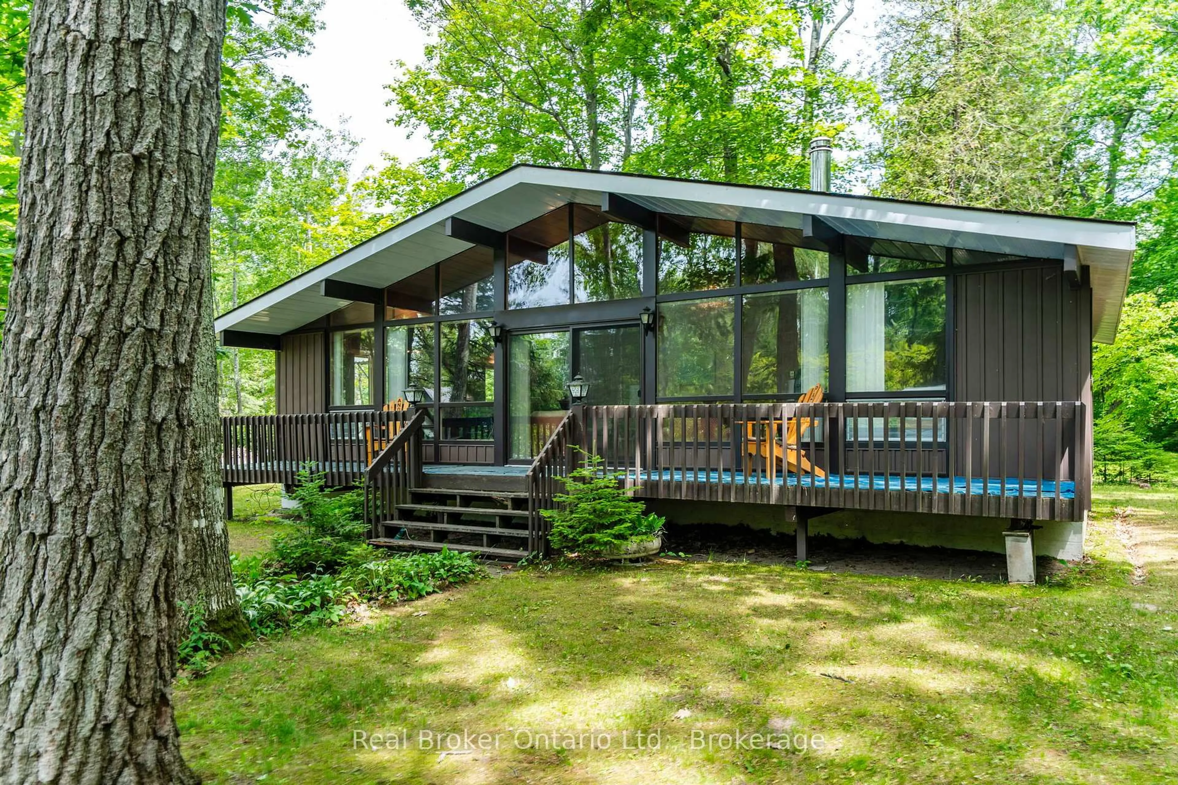 Home with vinyl exterior material, forest/trees view for 59 Marchand Rd, Tiny Ontario L9M 1R3