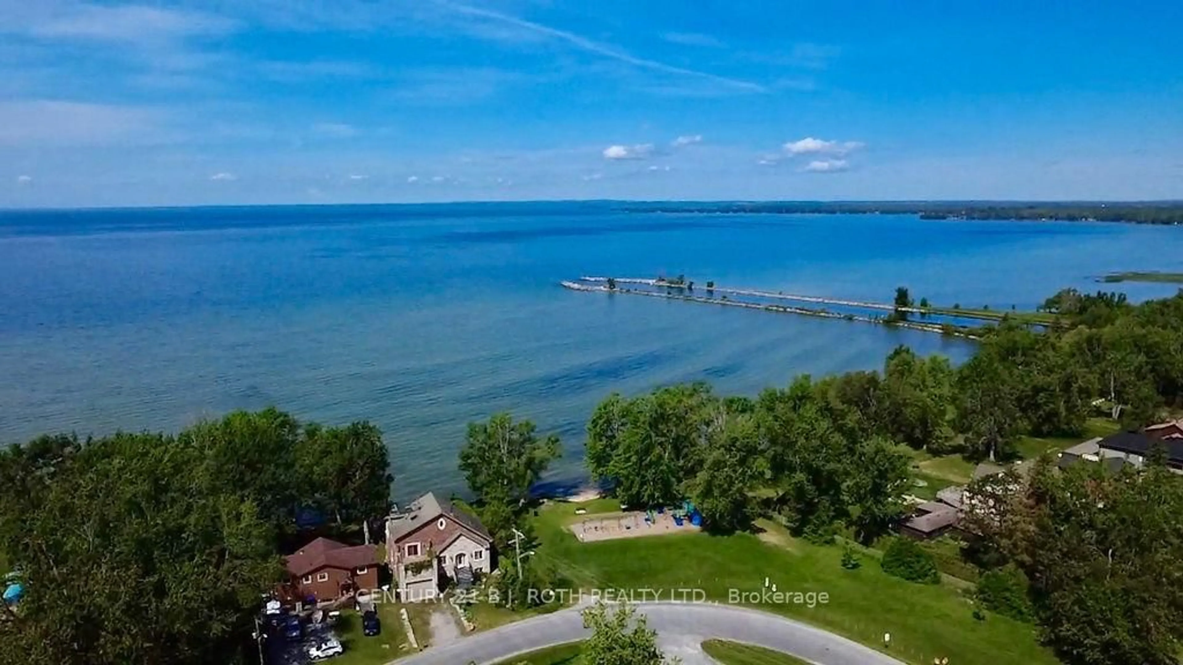 A pic from outside/outdoor area/front of a property/back of a property/a pic from drone, water/lake/river/ocean view for 51 Laguna Pkwy #9, Ramara Ontario L0K 1B0