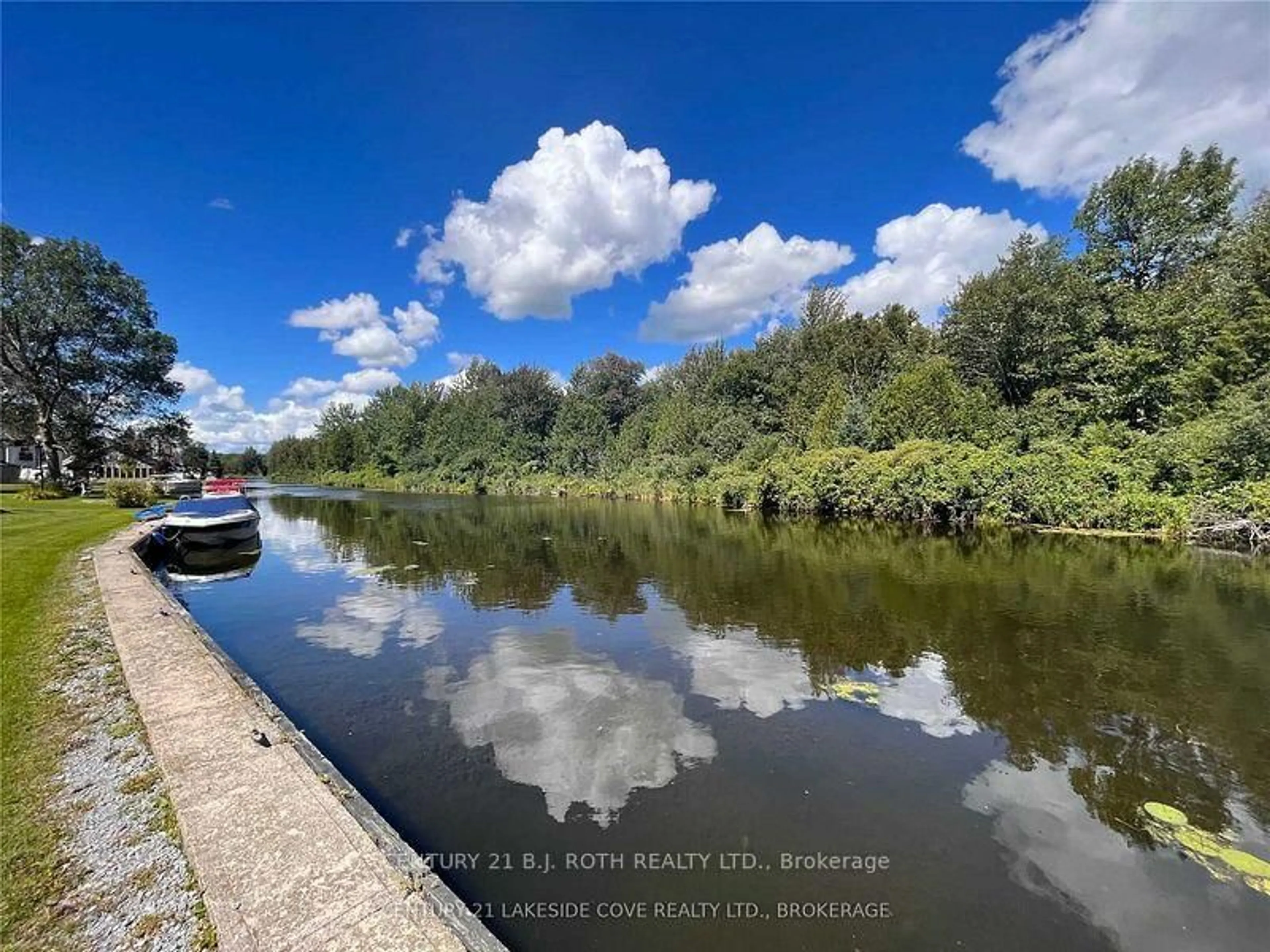 A pic from outside/outdoor area/front of a property/back of a property/a pic from drone, water/lake/river/ocean view for 51 Laguna Pkwy #9, Ramara Ontario L0K 1B0