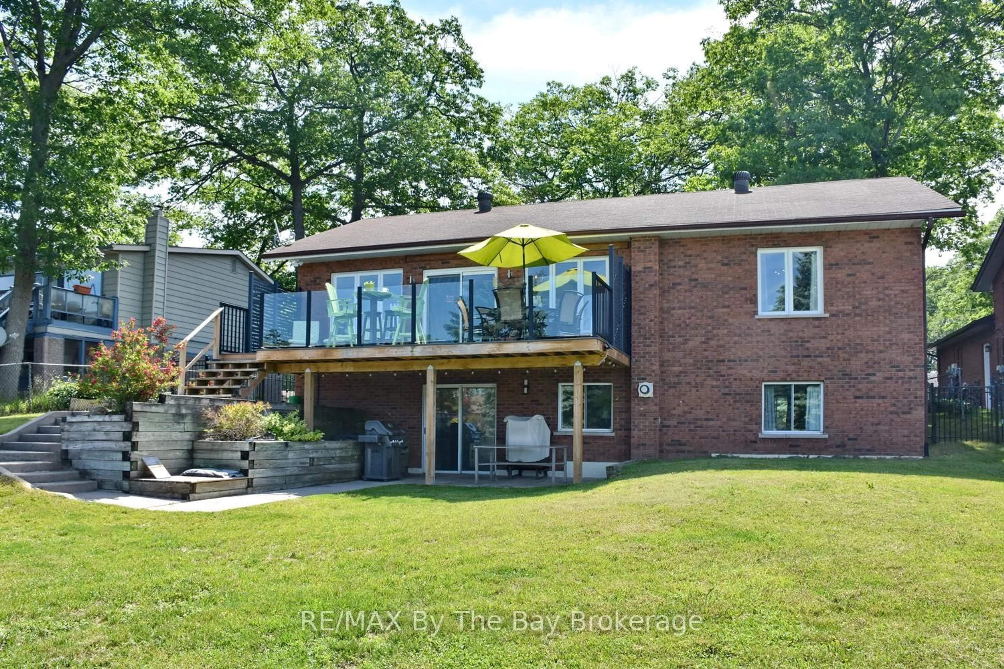 Home with brick exterior material, water/lake/river/ocean view for 1434 RIVER Rd, Wasaga Beach Ontario L9Z 2W5