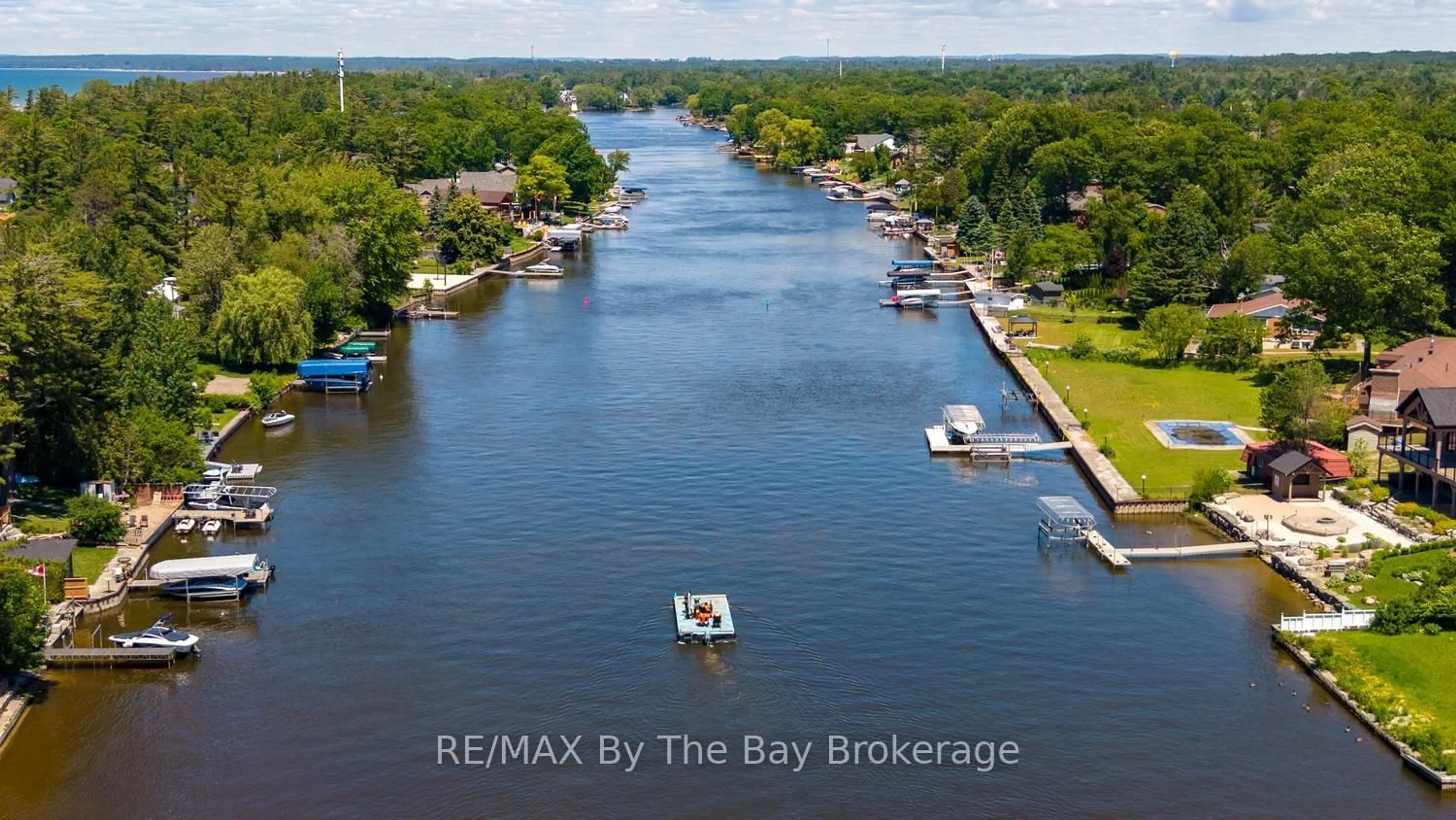 A pic from outside/outdoor area/front of a property/back of a property/a pic from drone, water/lake/river/ocean view for 1434 RIVER Rd, Wasaga Beach Ontario L9Z 2W5