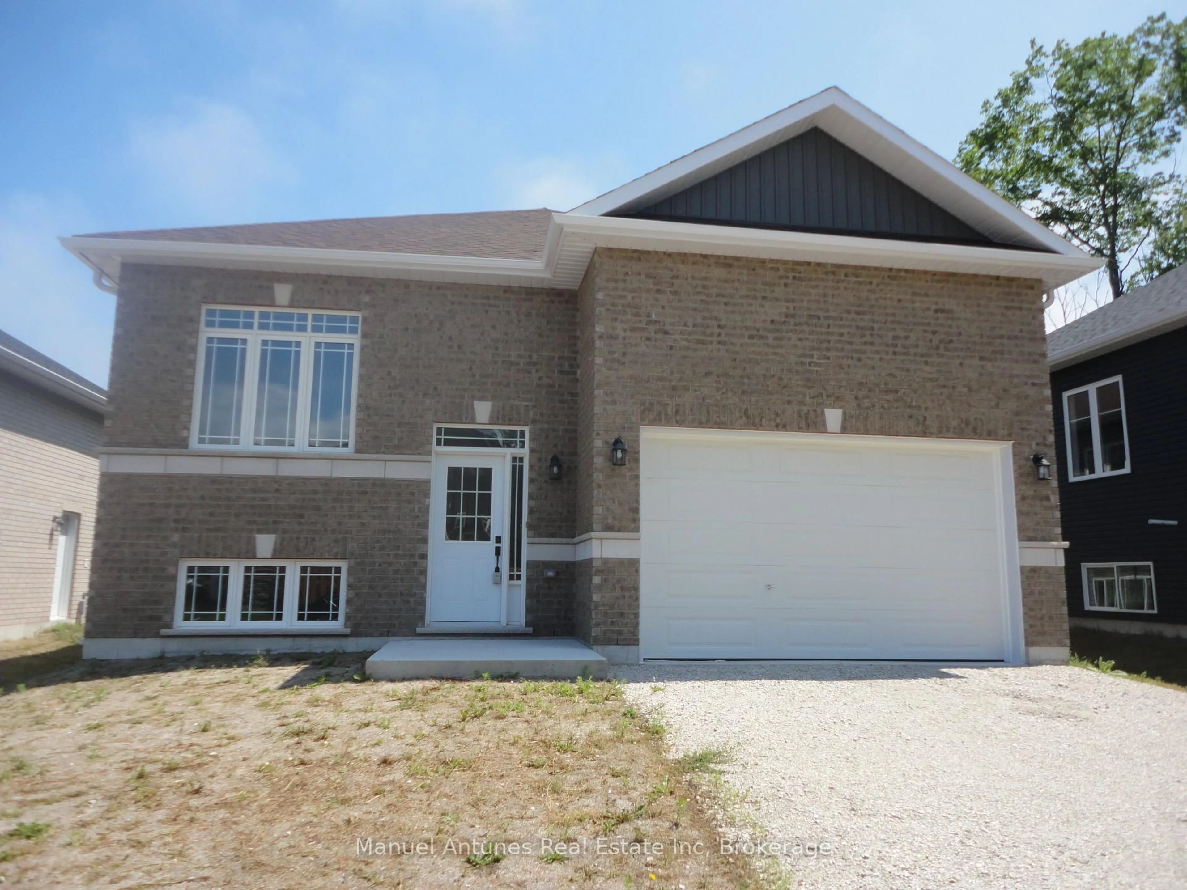 Home with brick exterior material, street for 4 Joanne Cres, Wasaga Beach Ontario L9Z 0S2