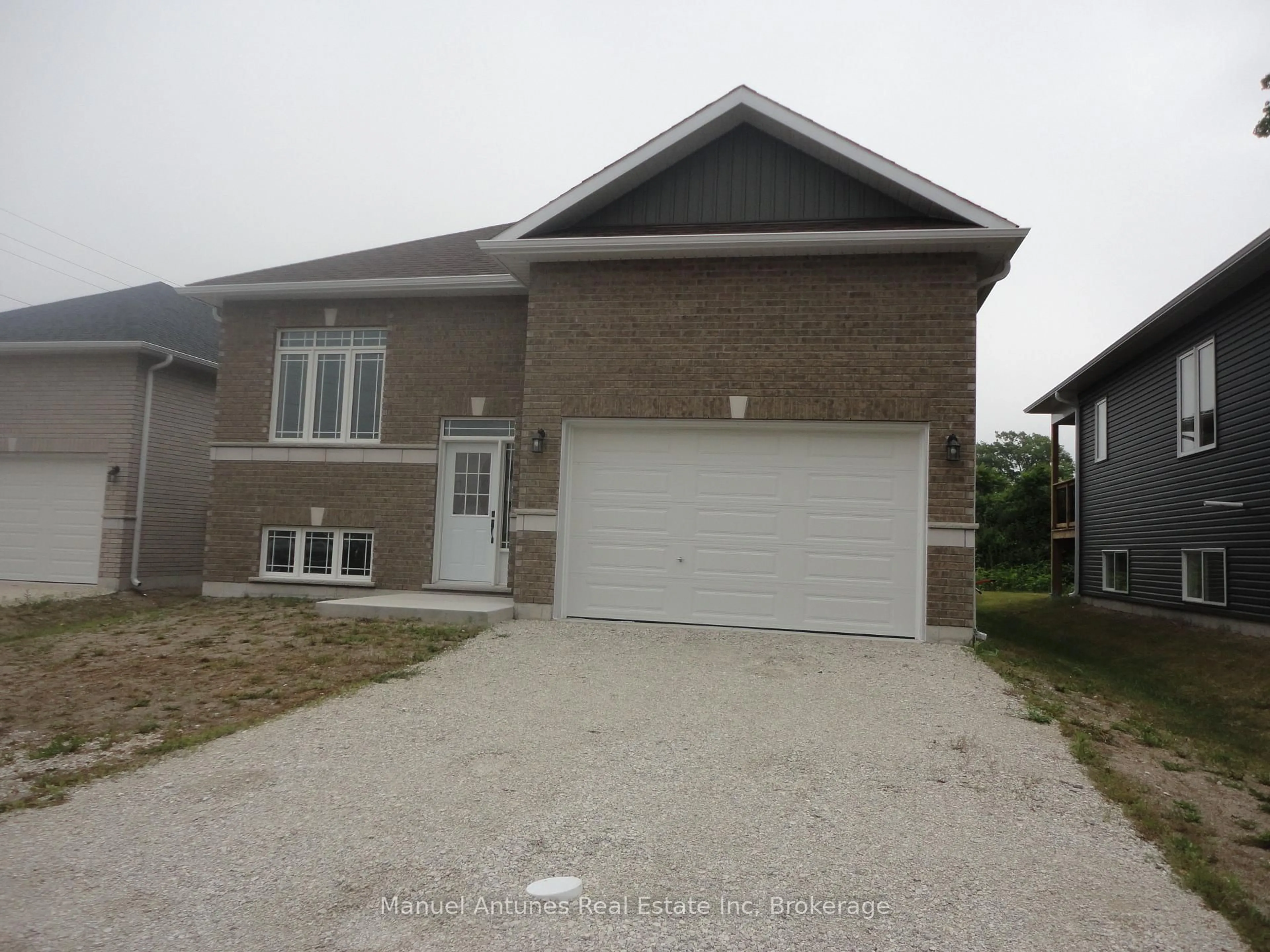 Home with brick exterior material, street for 4 Joanne Cres, Wasaga Beach Ontario L9Z 0S2