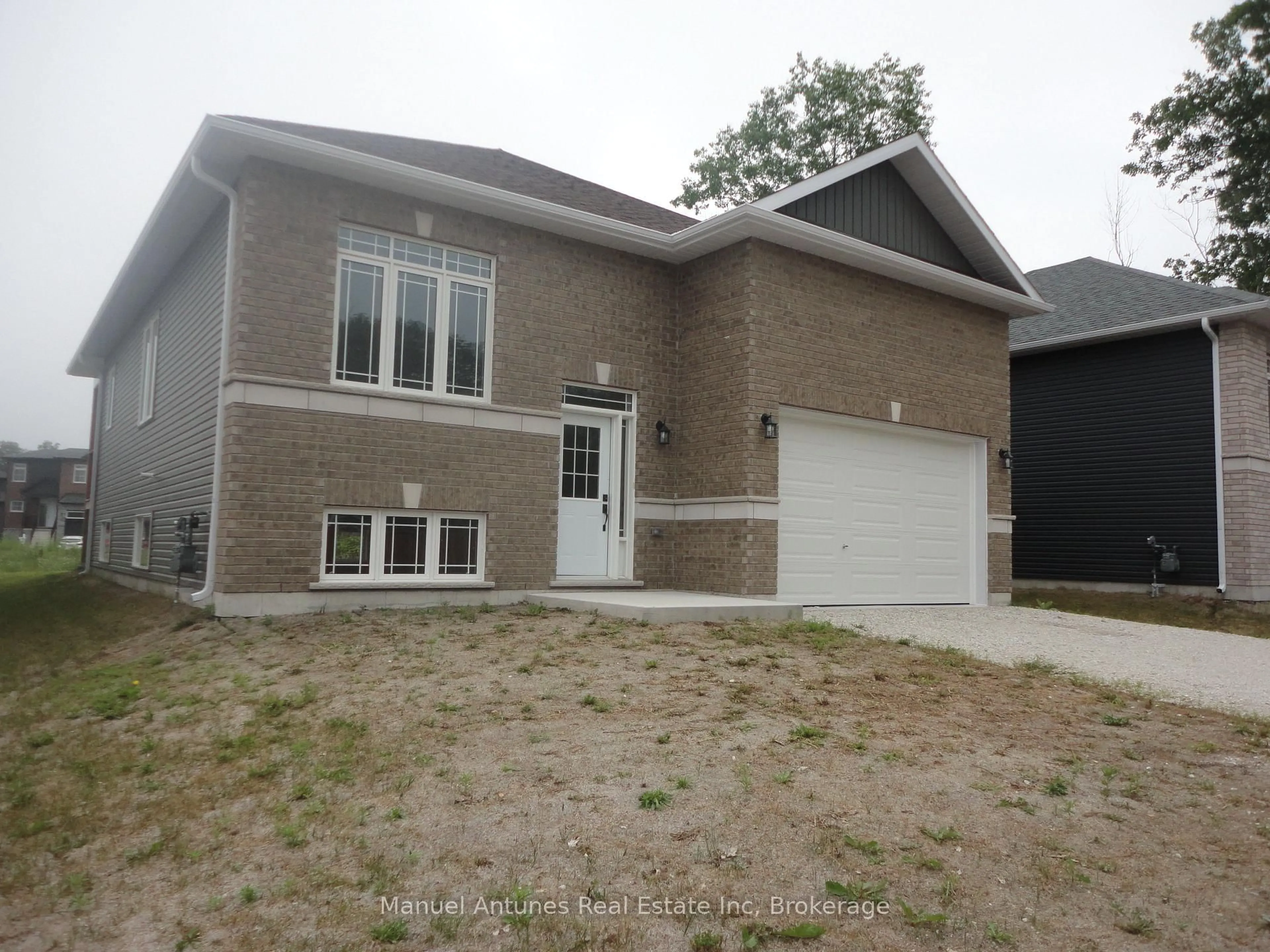Home with brick exterior material, street for 4 Joanne Cres, Wasaga Beach Ontario L9Z 0S2