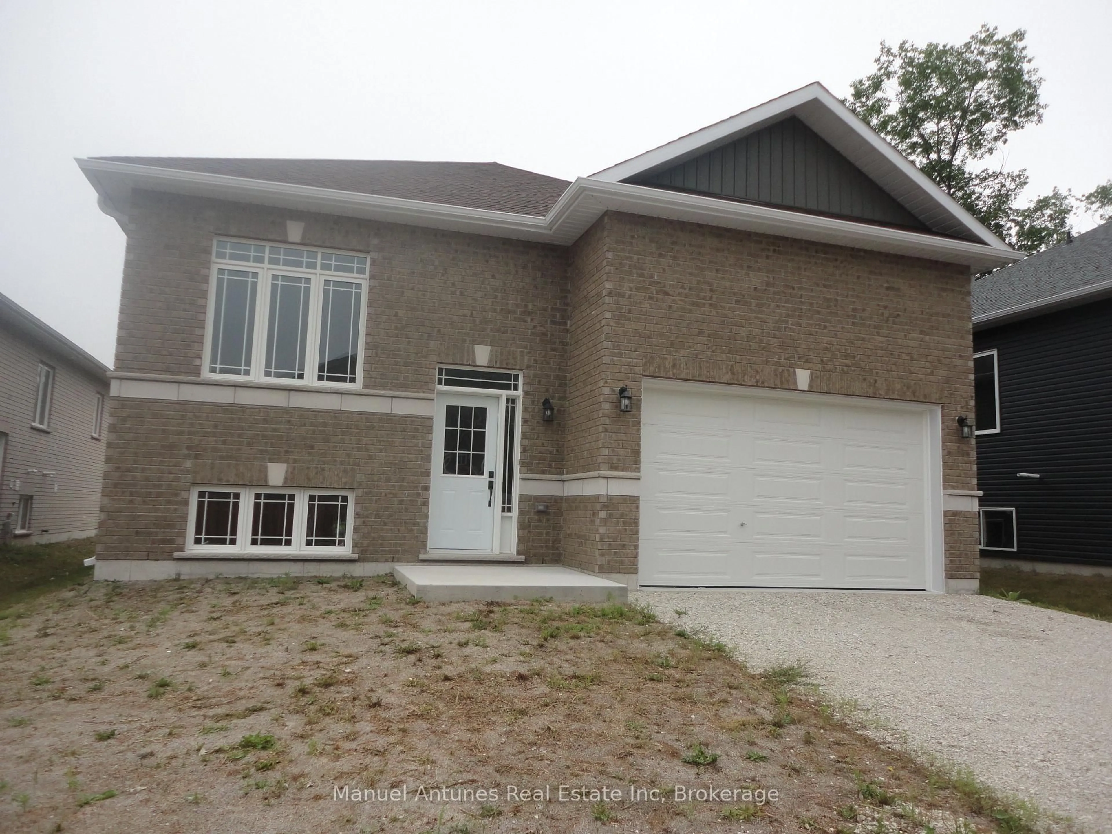 Home with brick exterior material, street for 4 Joanne Cres, Wasaga Beach Ontario L9Z 0S2