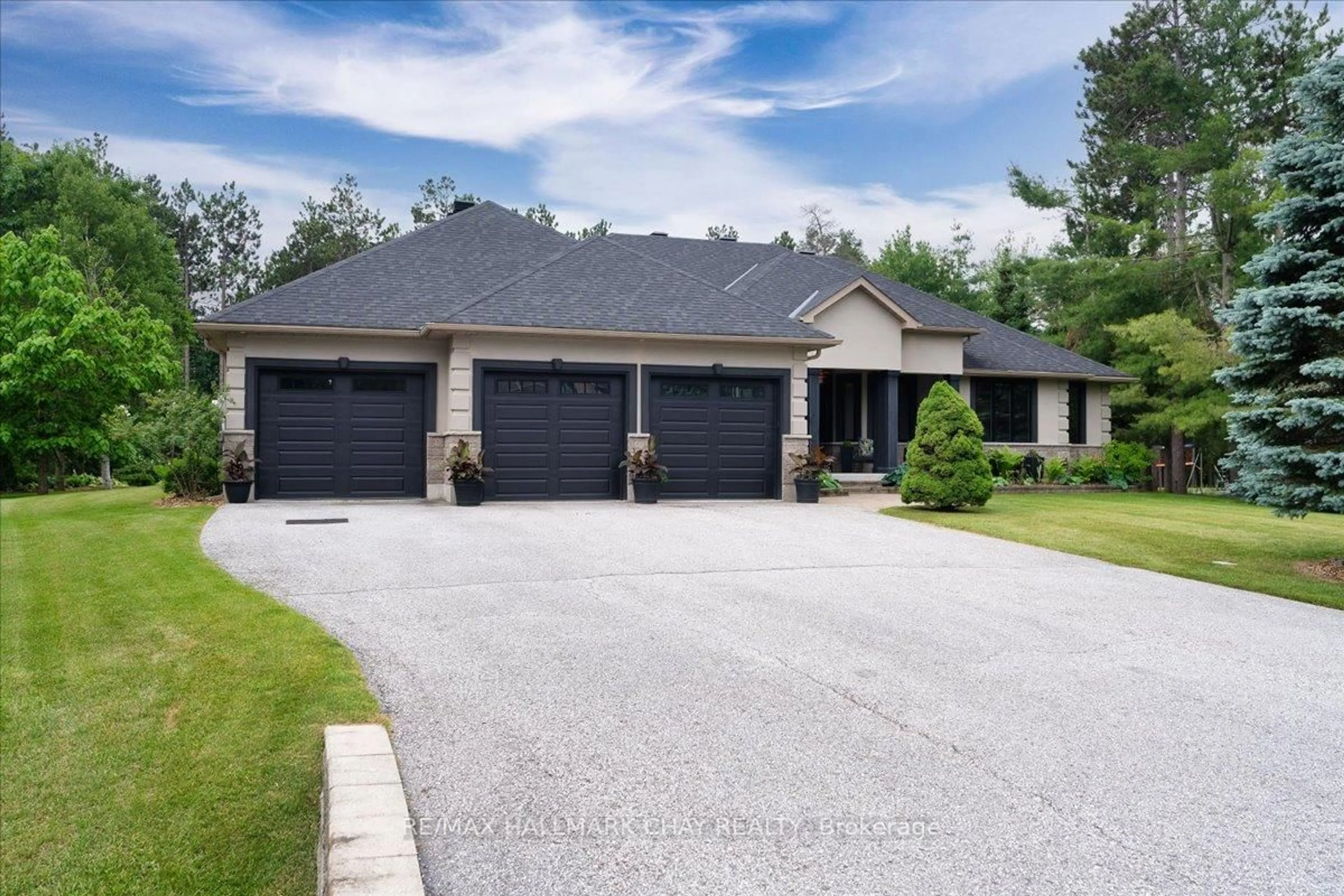Home with brick exterior material, street for 66 LUELLA Blvd, Springwater Ontario L0L 1Y2