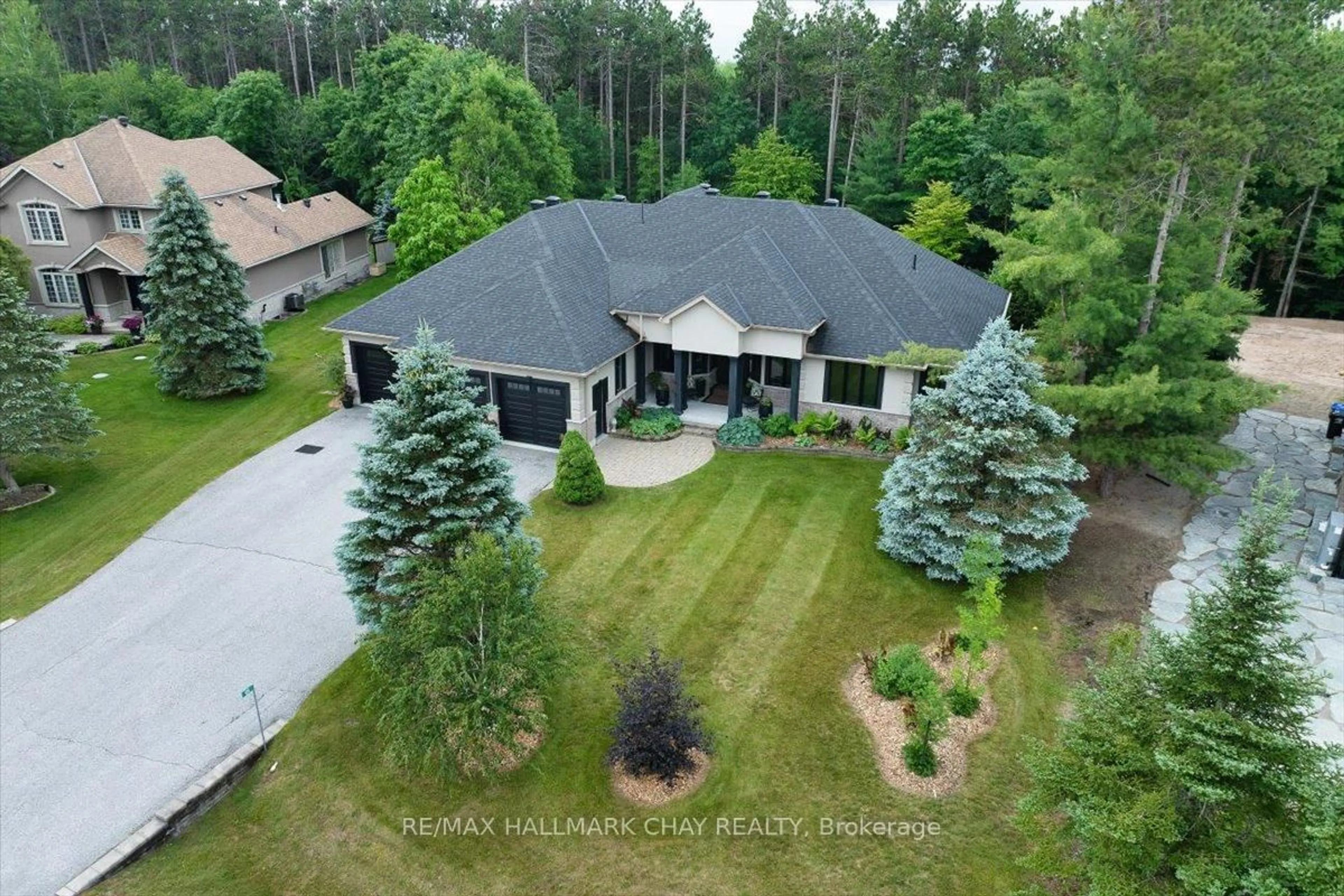A pic from outside/outdoor area/front of a property/back of a property/a pic from drone, unknown for 66 LUELLA Blvd, Springwater Ontario L0L 1Y2
