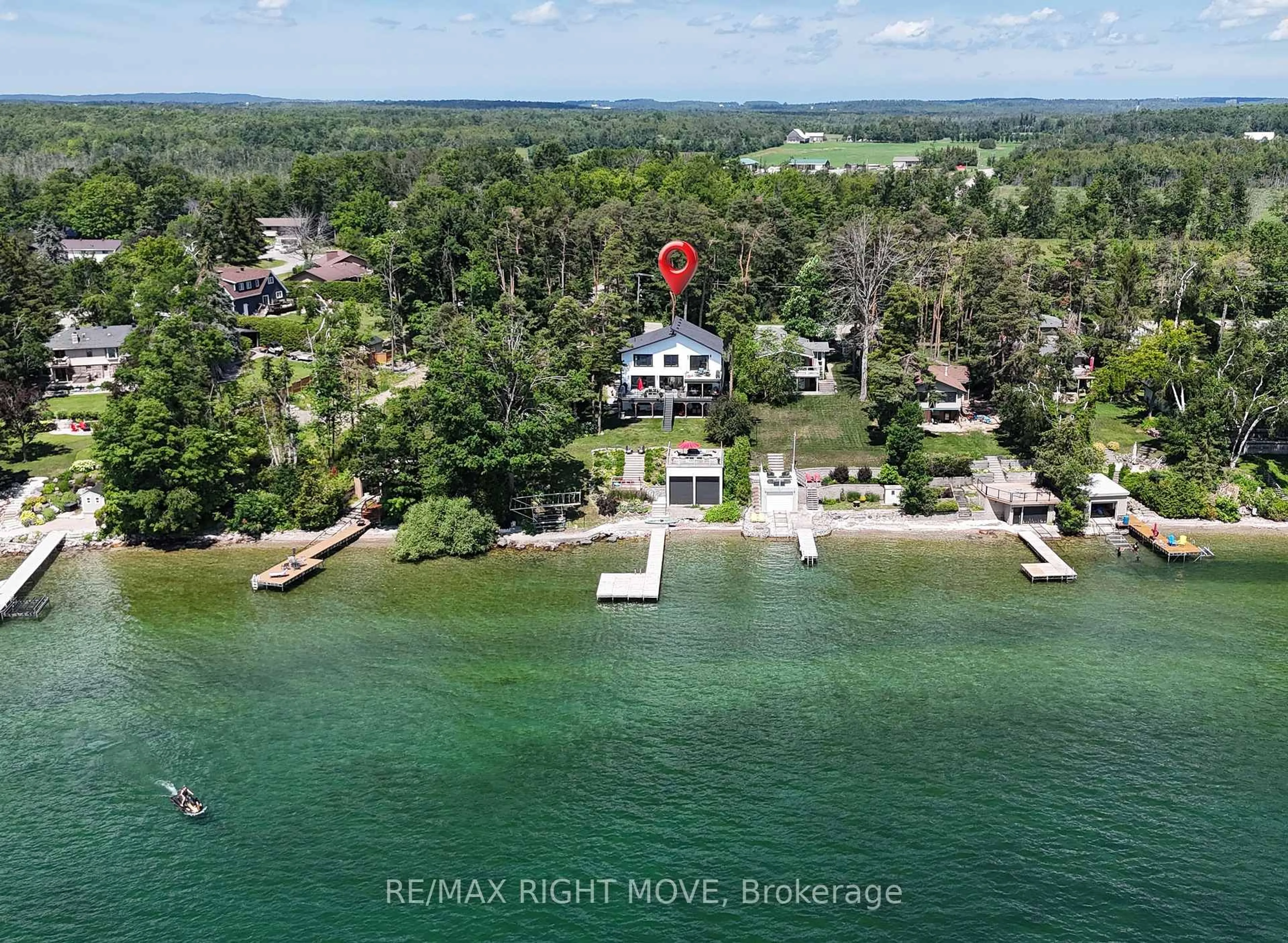 A pic from outside/outdoor area/front of a property/back of a property/a pic from drone, water/lake/river/ocean view for 1189 Woodland Dr, Oro-Medonte Ontario L3V 0R8