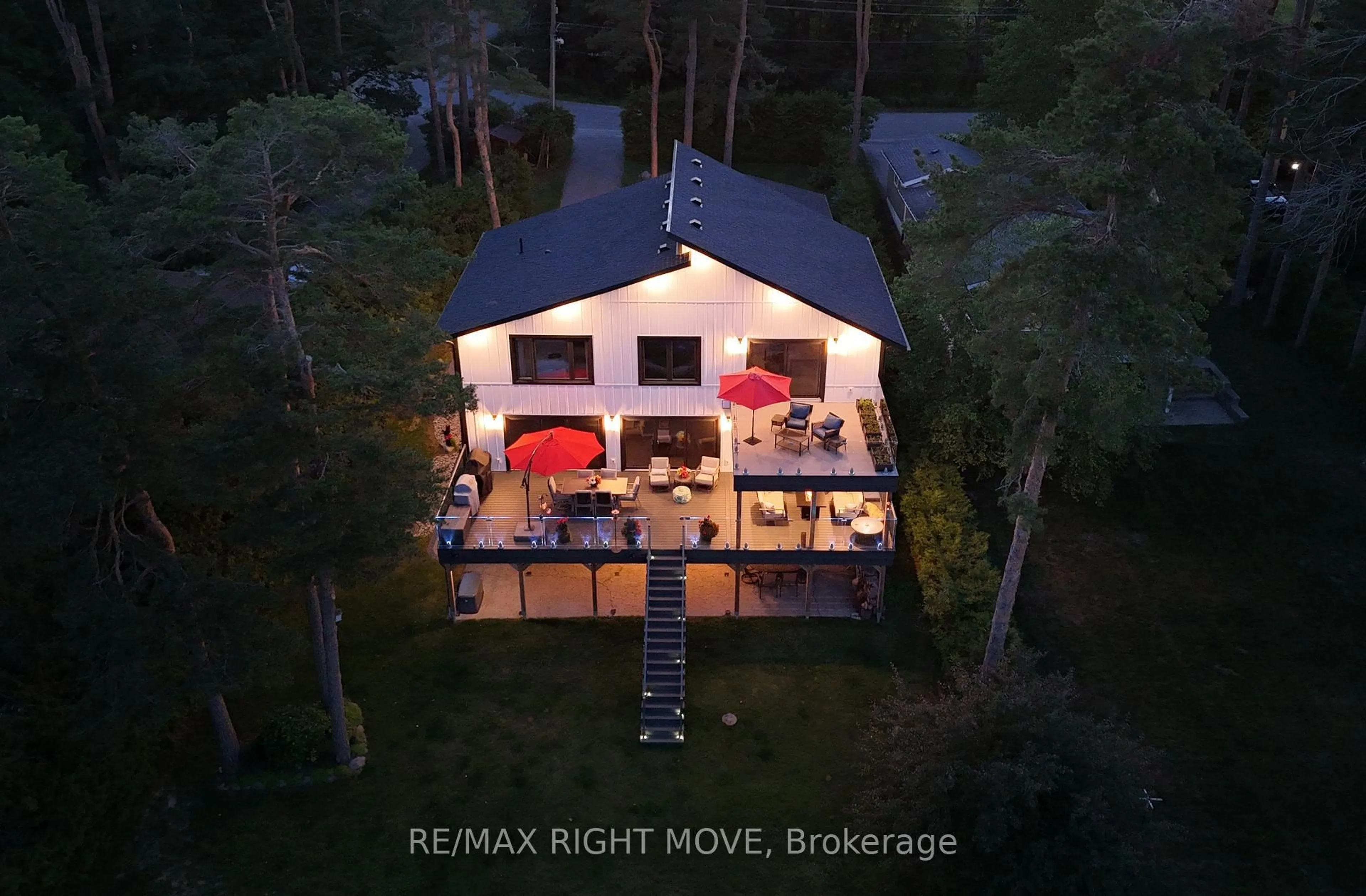 A pic from outside/outdoor area/front of a property/back of a property/a pic from drone, street for 1189 Woodland Dr, Oro-Medonte Ontario L3V 0R8