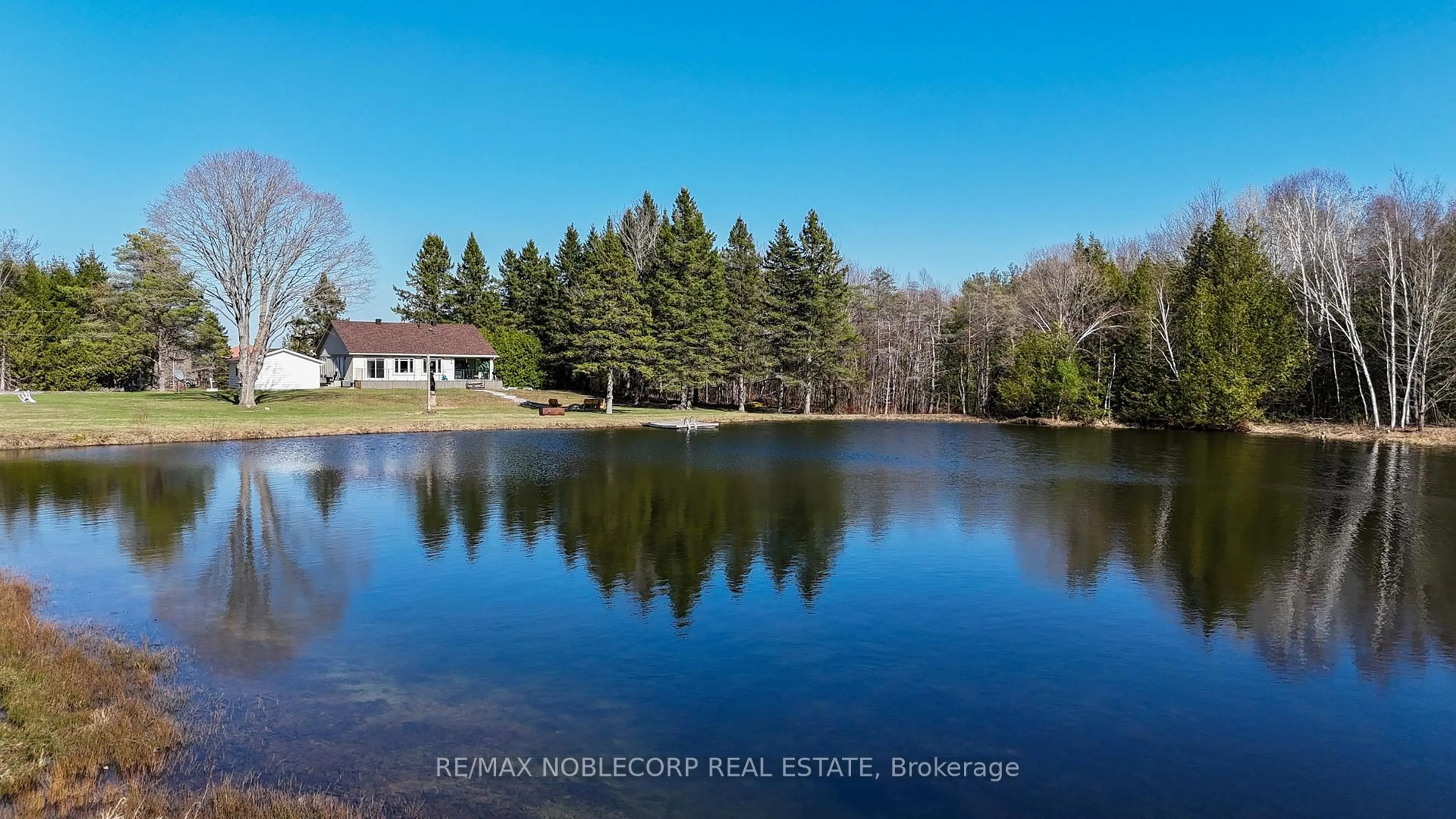 A pic from outside/outdoor area/front of a property/back of a property/a pic from drone, water/lake/river/ocean view for 3128 New Brailey Line, Severn Ontario L3V 5Z4