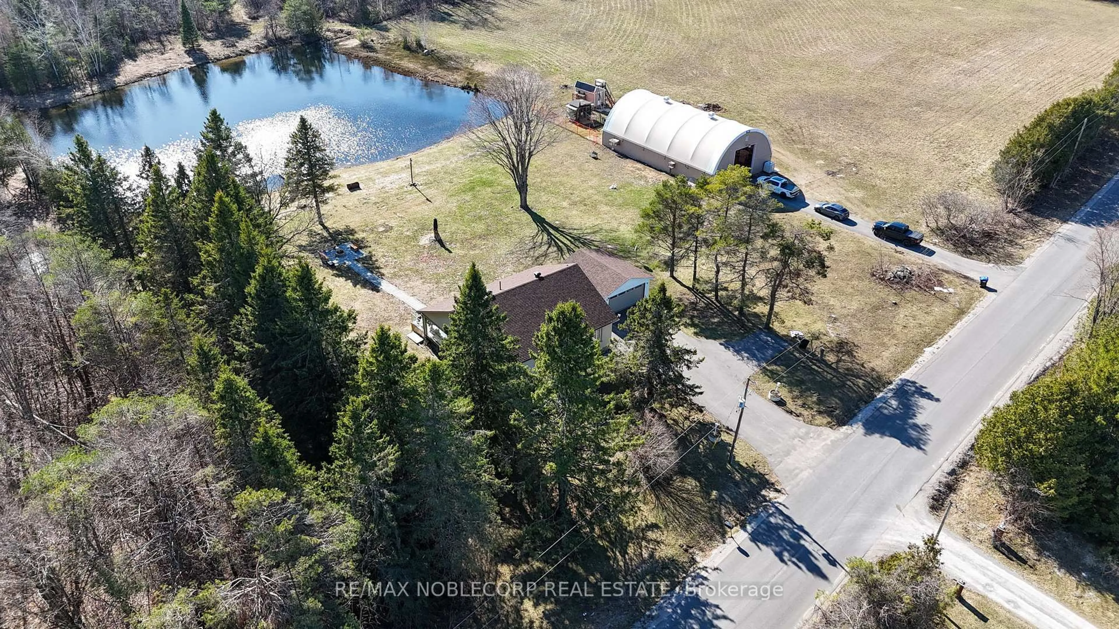 A pic from outside/outdoor area/front of a property/back of a property/a pic from drone, water/lake/river/ocean view for 3128 New Brailey Line, Severn Ontario L3V 5Z4