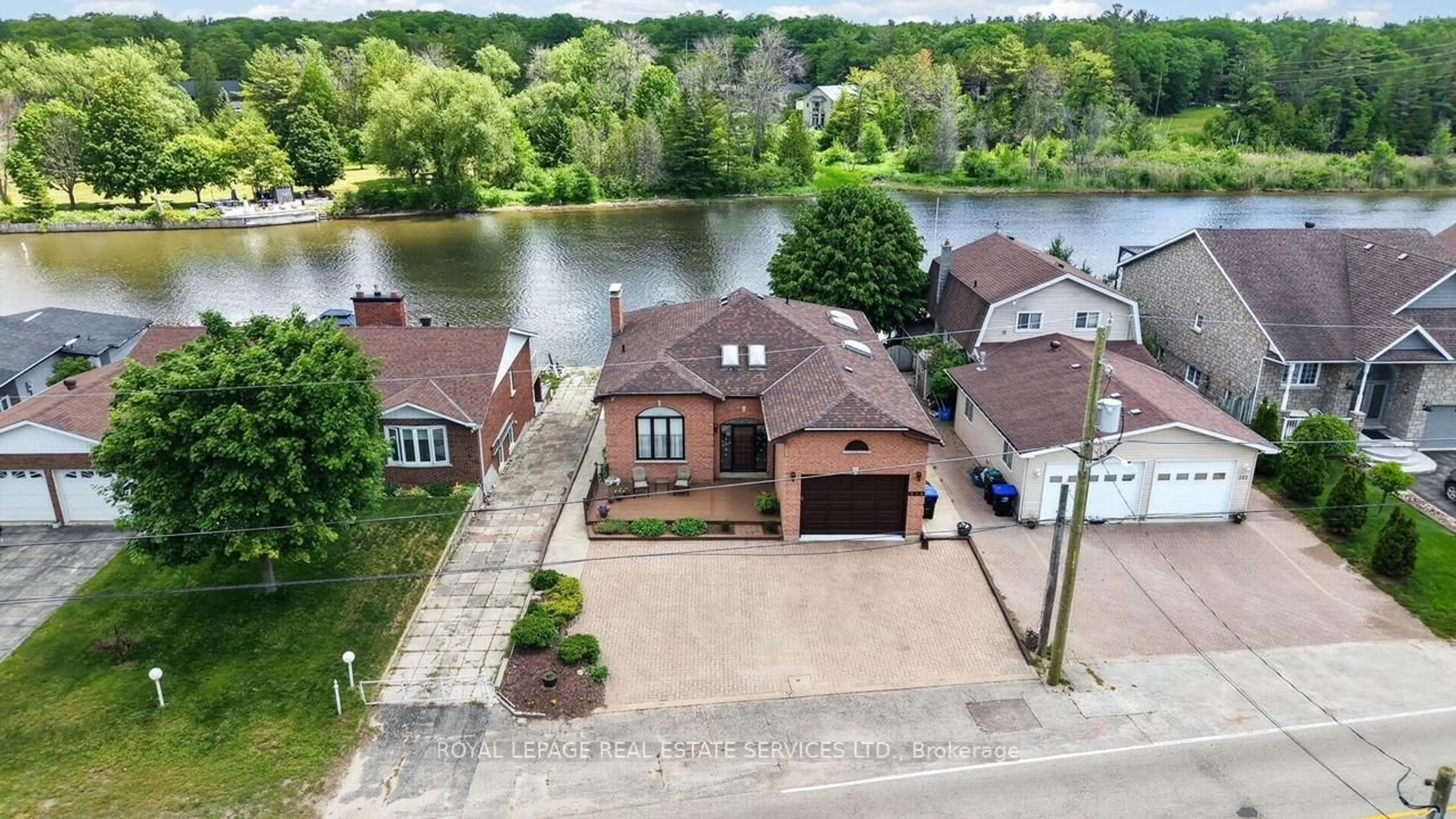 A pic from outside/outdoor area/front of a property/back of a property/a pic from drone, water/lake/river/ocean view for 319 Old Mosley St, Wasaga Beach Ontario L9Z 2S2
