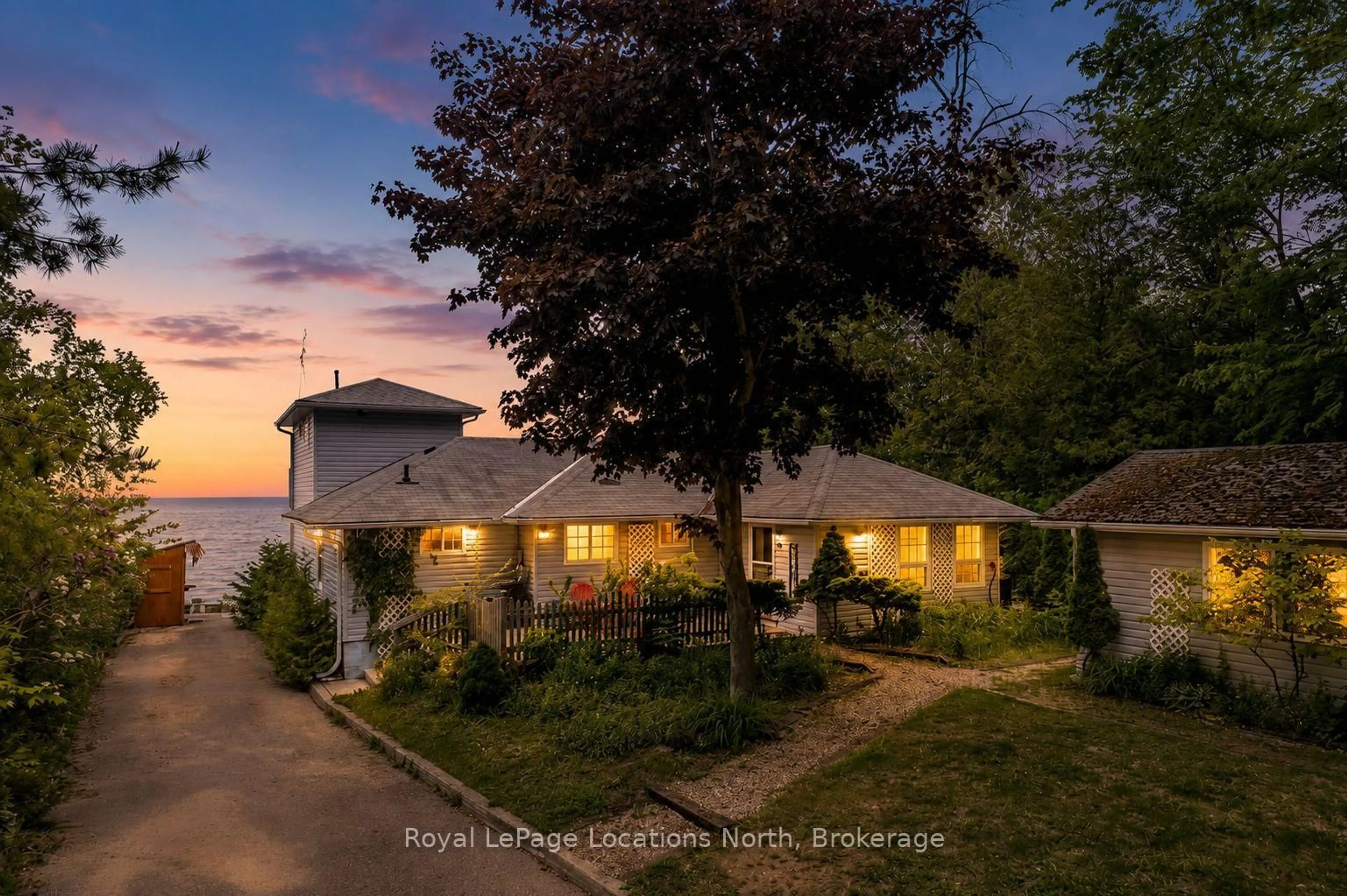 A pic from outside/outdoor area/front of a property/back of a property/a pic from drone, street for 2222 Shore Lane, Wasaga Beach Ontario L9Z 2X7