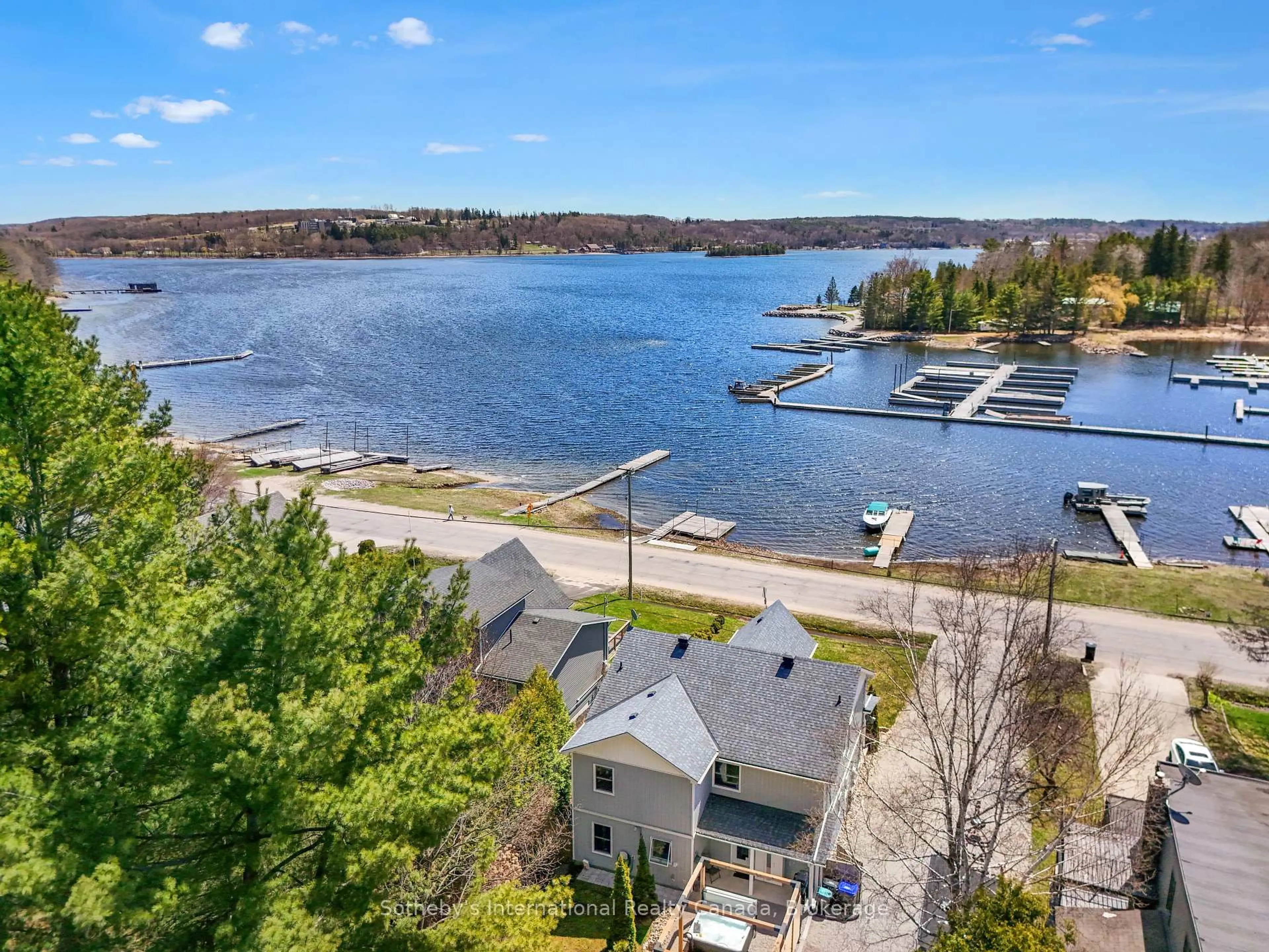 A pic from outside/outdoor area/front of a property/back of a property/a pic from drone, water/lake/river/ocean view for 604 CHAMPLAIN Rd, Tiny Ontario L9M 0C2