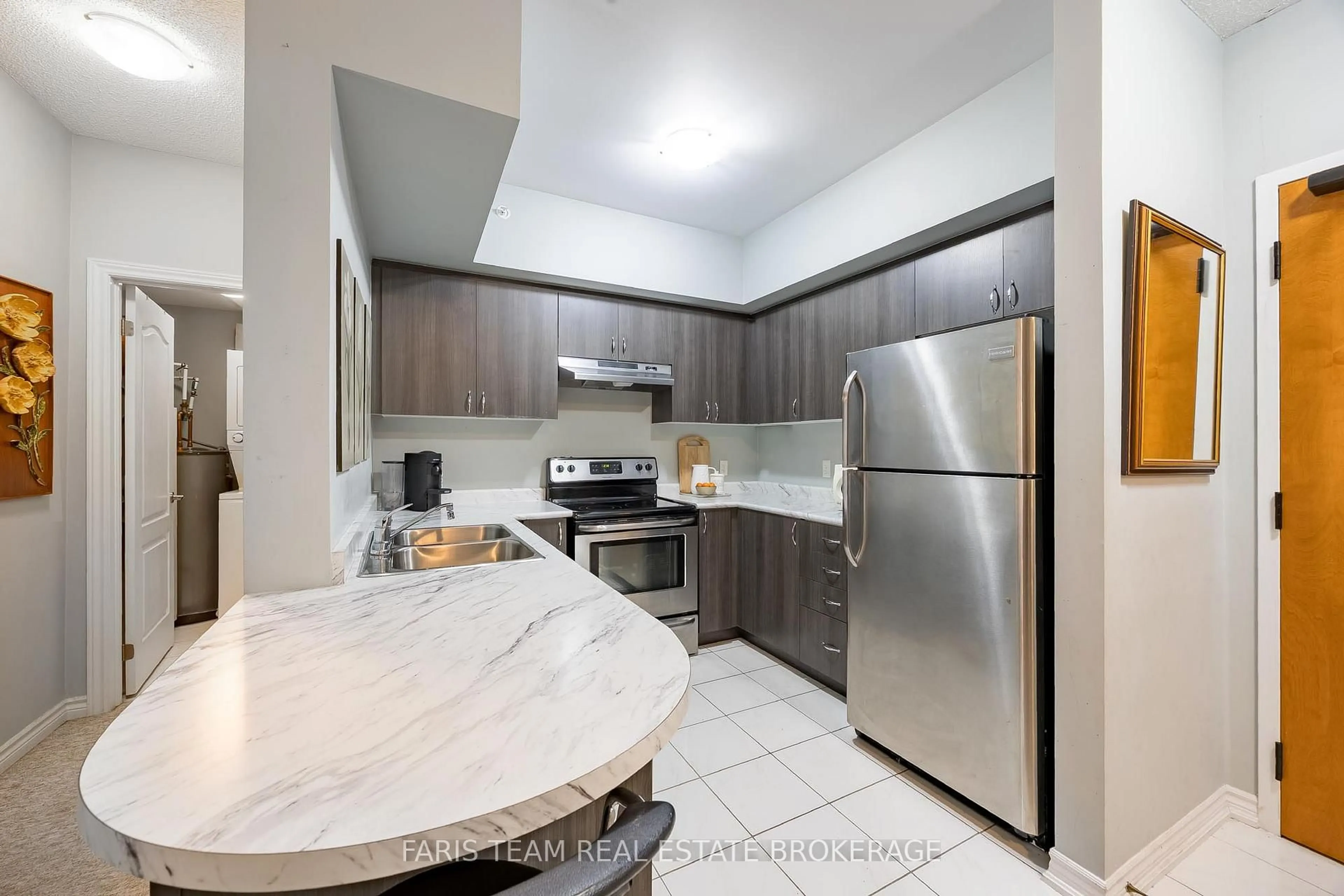 Standard kitchen, ceramic/tile floor for 100 Dean Ave #207, Barrie Ontario L9J 0H1
