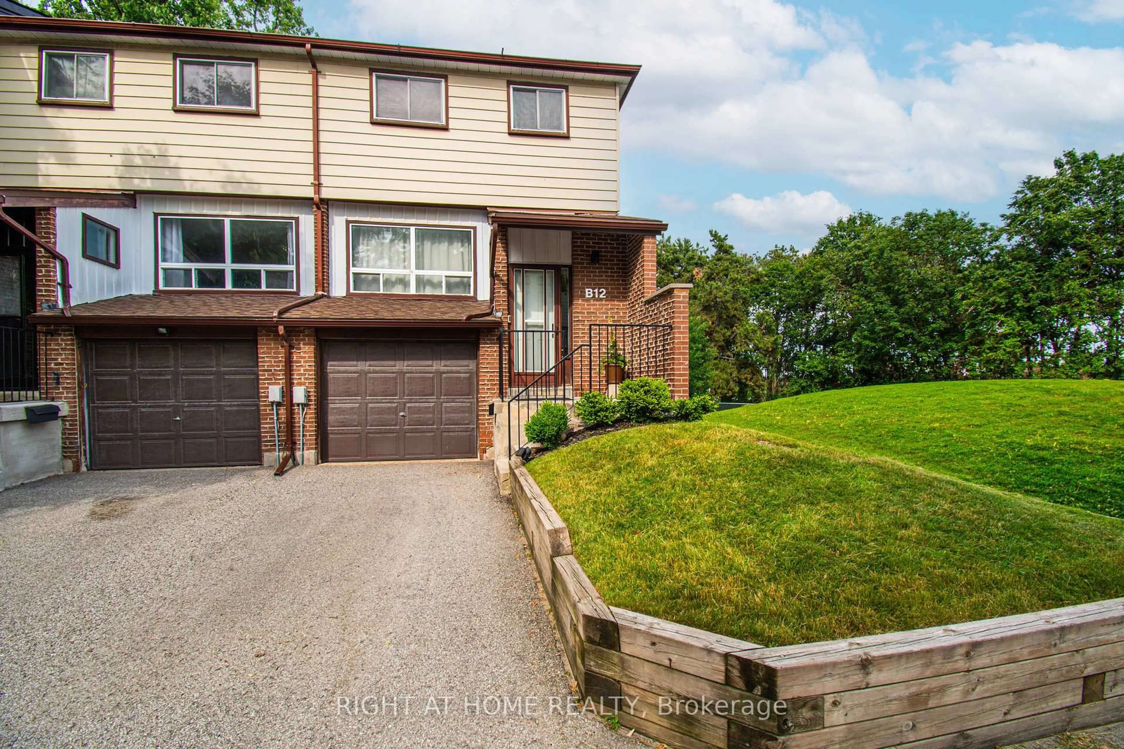 Home with brick exterior material, street for 63 Ferris Lane #B12, Barrie Ontario L4M 5C4
