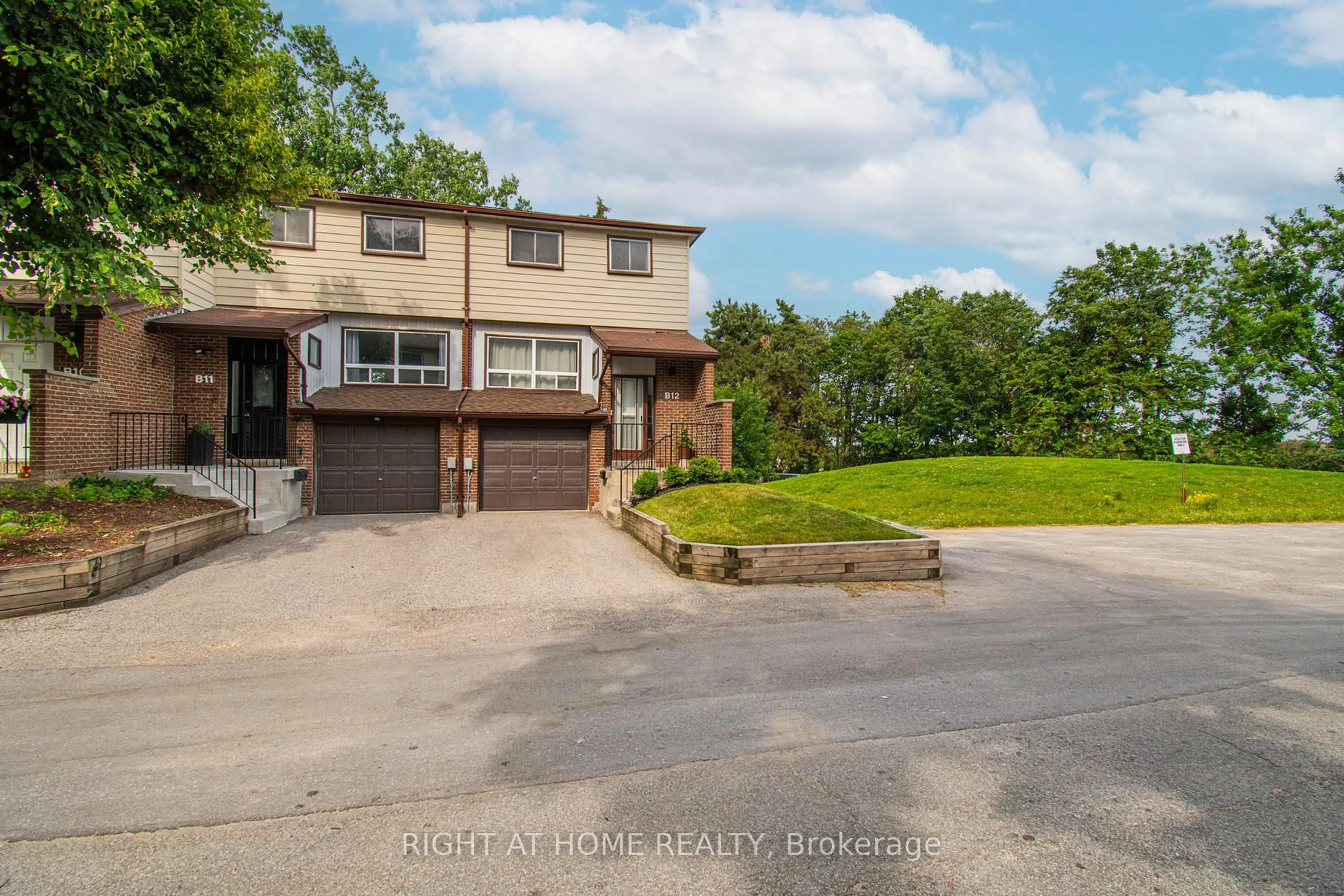 A pic from outside/outdoor area/front of a property/back of a property/a pic from drone, water/lake/river/ocean view for 63 Ferris Lane #B12, Barrie Ontario L4M 5C4