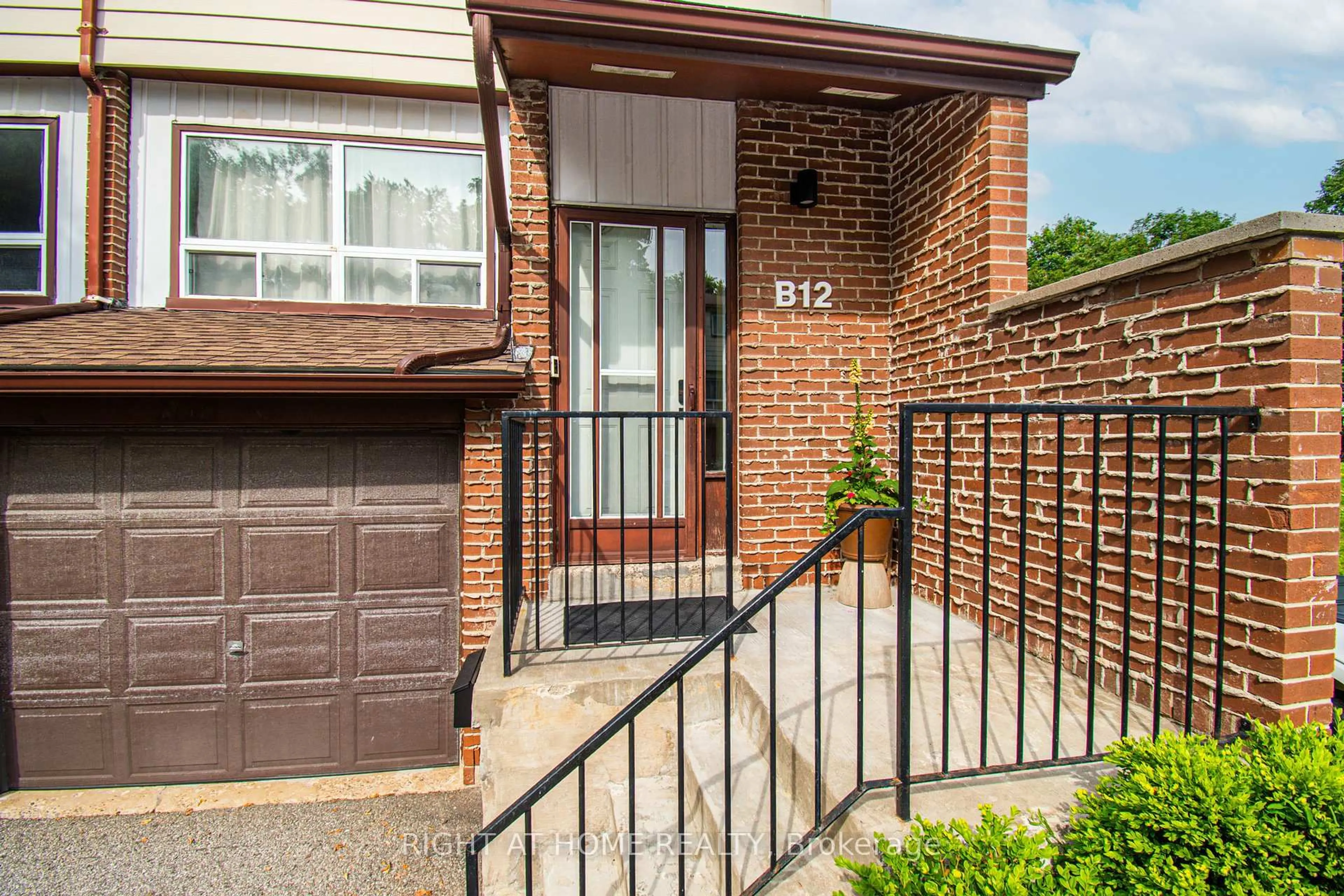 Home with brick exterior material, street for 63 Ferris Lane #B12, Barrie Ontario L4M 5C4