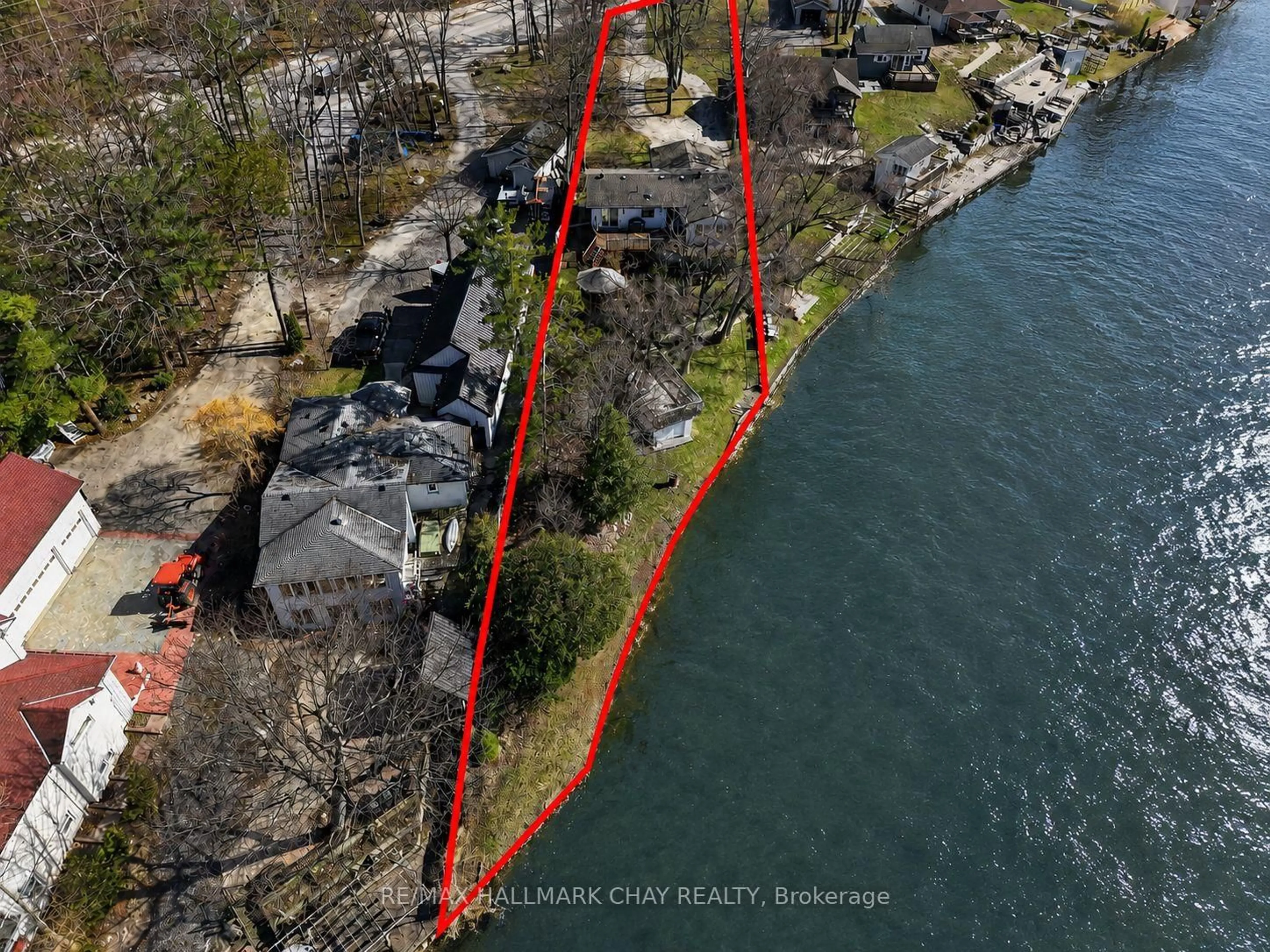 A pic from outside/outdoor area/front of a property/back of a property/a pic from drone, water/lake/river/ocean view for 1976 River Rd, Wasaga Beach Ontario L9Z 2W2