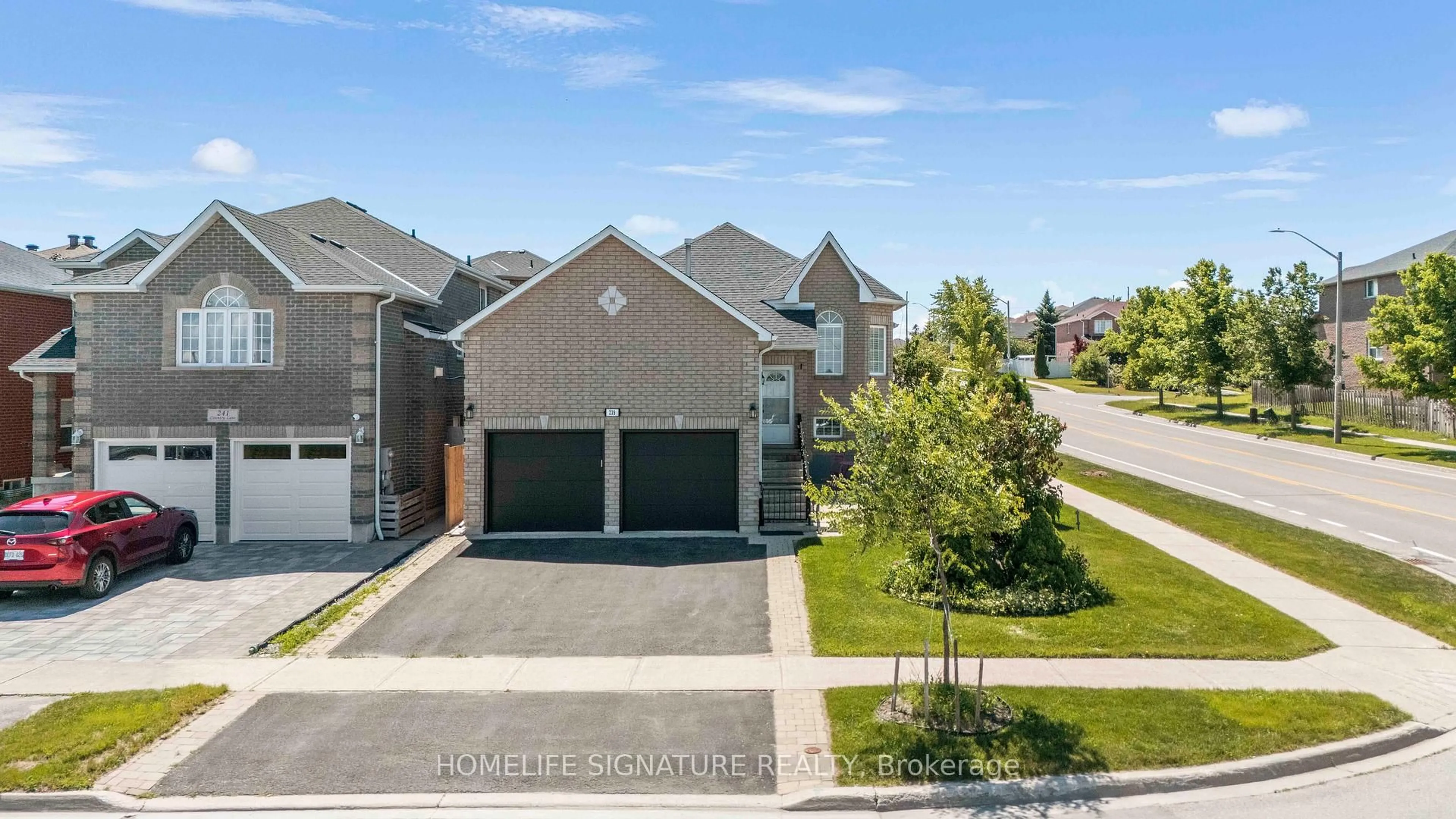 A pic from outside/outdoor area/front of a property/back of a property/a pic from drone, street for 239 Country Lane, Barrie Ontario L4N 0W2