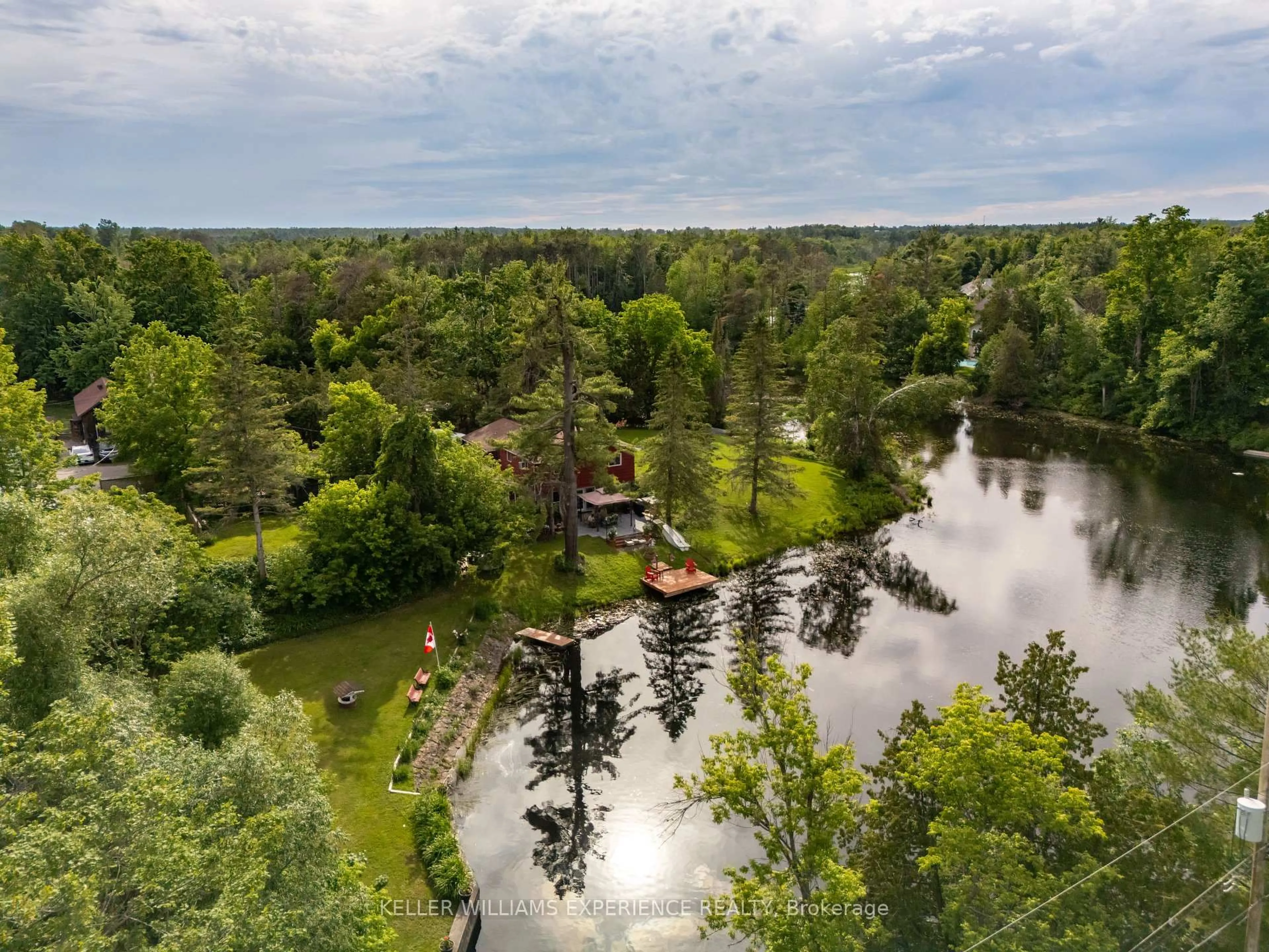 A pic from outside/outdoor area/front of a property/back of a property/a pic from drone, water/lake/river/ocean view for 3741 Cedar Rapids Dr, Severn Ontario L3V 6H2
