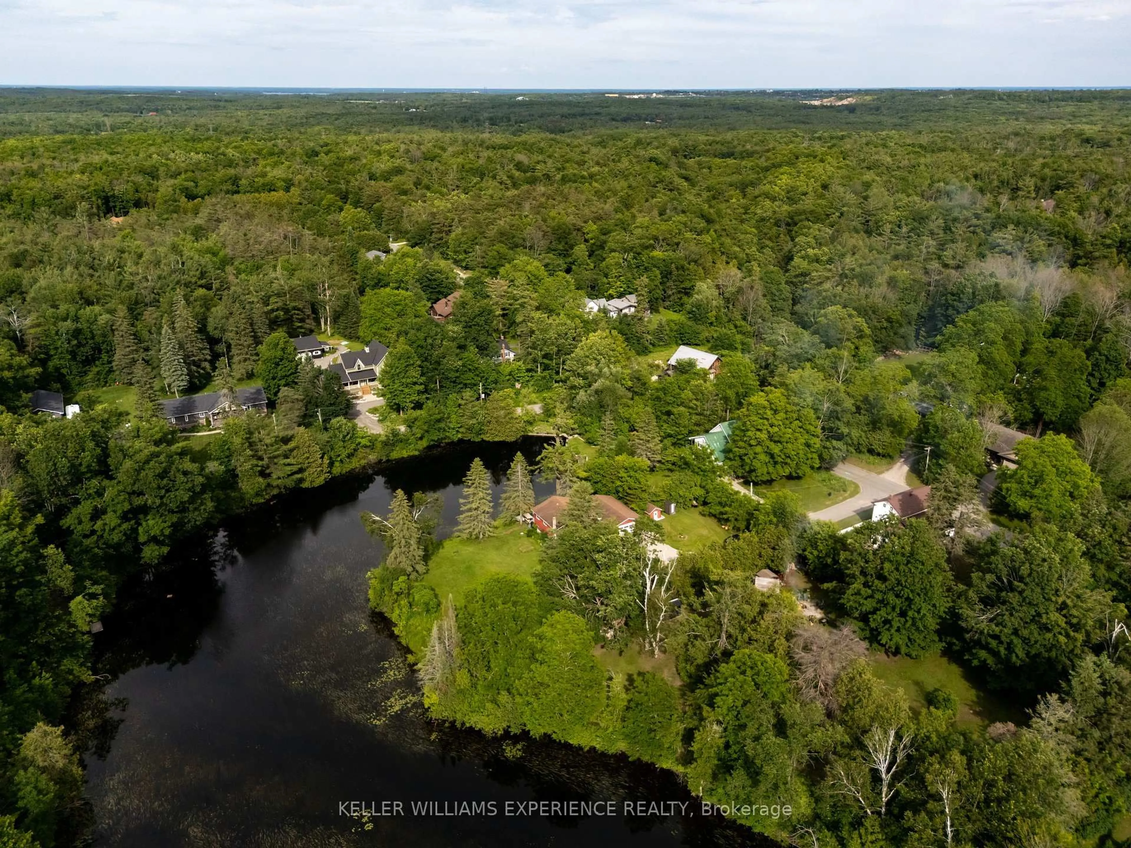 A pic from outside/outdoor area/front of a property/back of a property/a pic from drone, water/lake/river/ocean view for 3741 Cedar Rapids Dr, Severn Ontario L3V 6H2