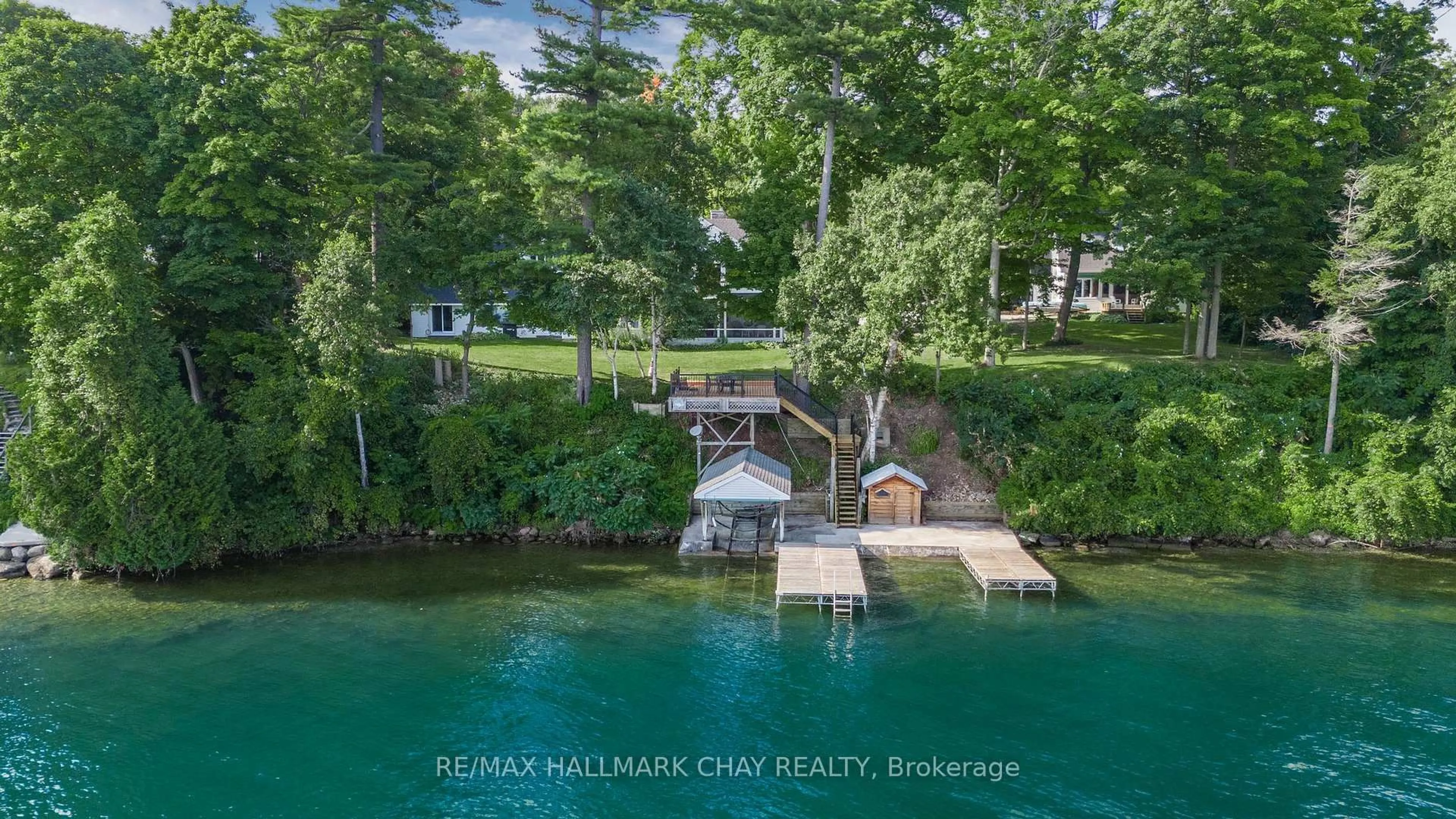 A pic from outside/outdoor area/front of a property/back of a property/a pic from drone, water/lake/river/ocean view for 209 Bay St, Oro-Medonte Ontario L0L 2L0