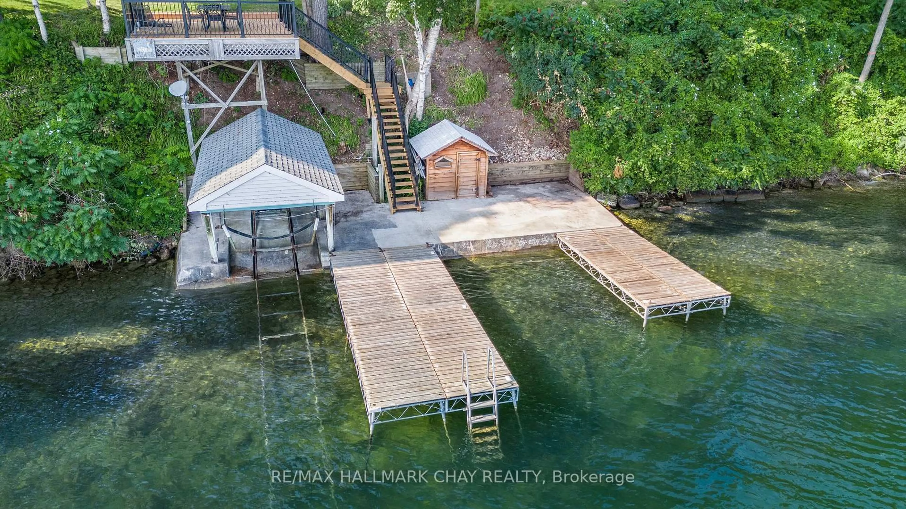 A pic from outside/outdoor area/front of a property/back of a property/a pic from drone, water/lake/river/ocean view for 209 Bay St, Oro-Medonte Ontario L0L 2L0