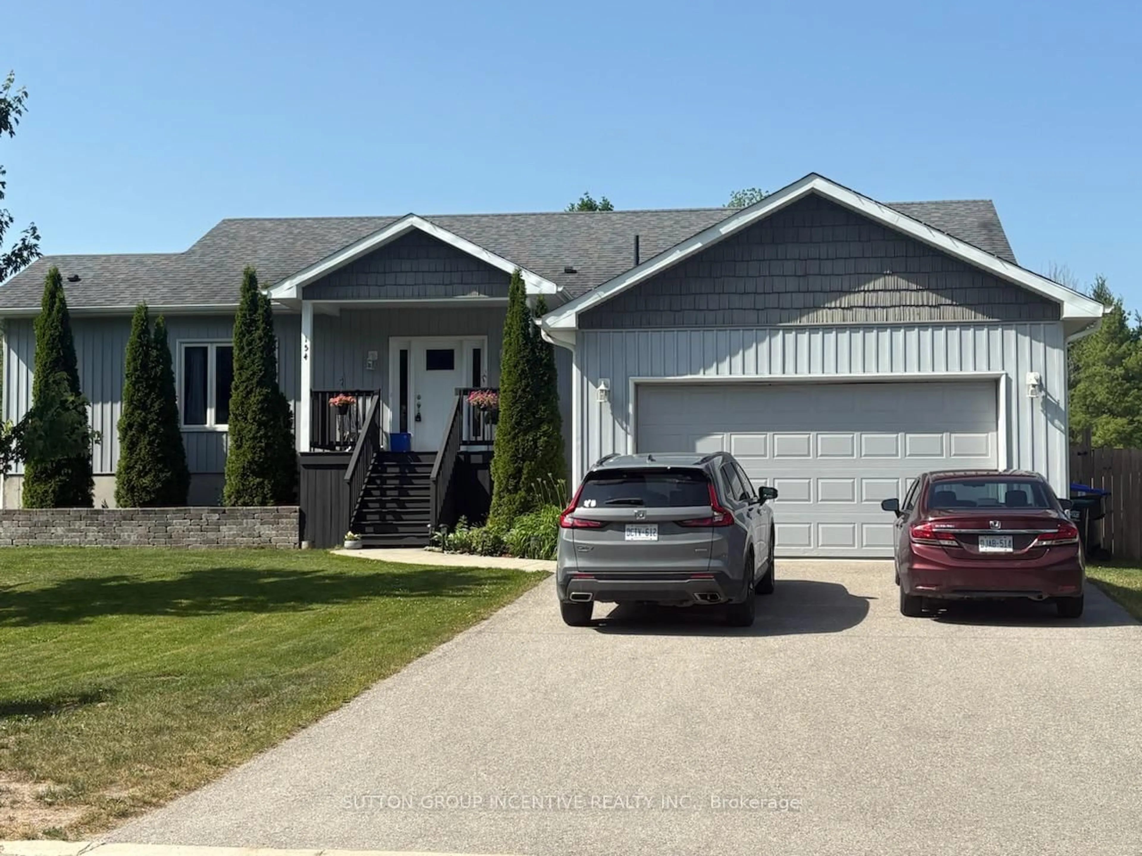 Home with vinyl exterior material, street for 154 Switzer St, Clearview Ontario L0M 1N0