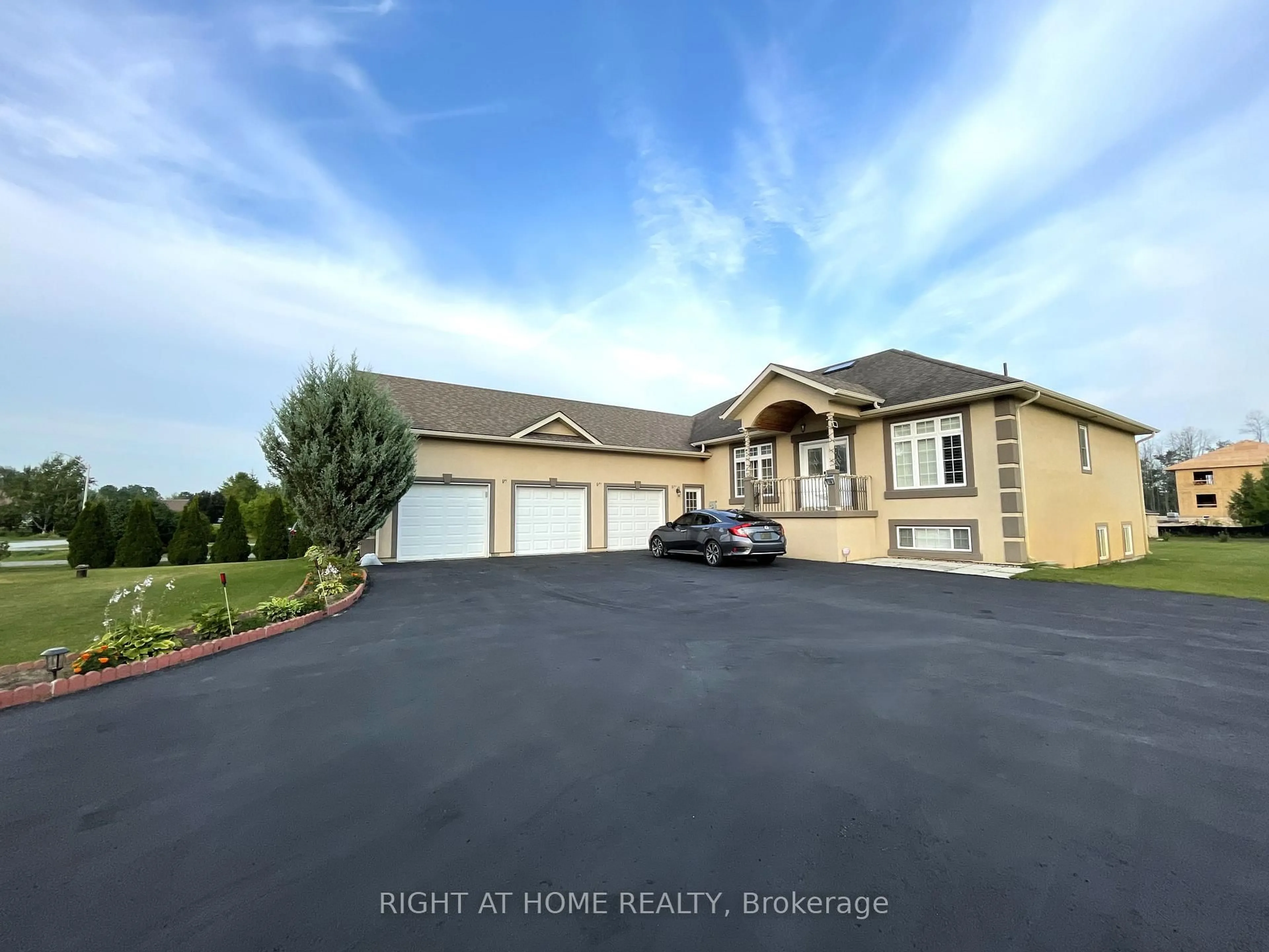 Home with vinyl exterior material, street for 16 WASAGA SANDS Dr, Wasaga Beach Ontario L9Z 1J6