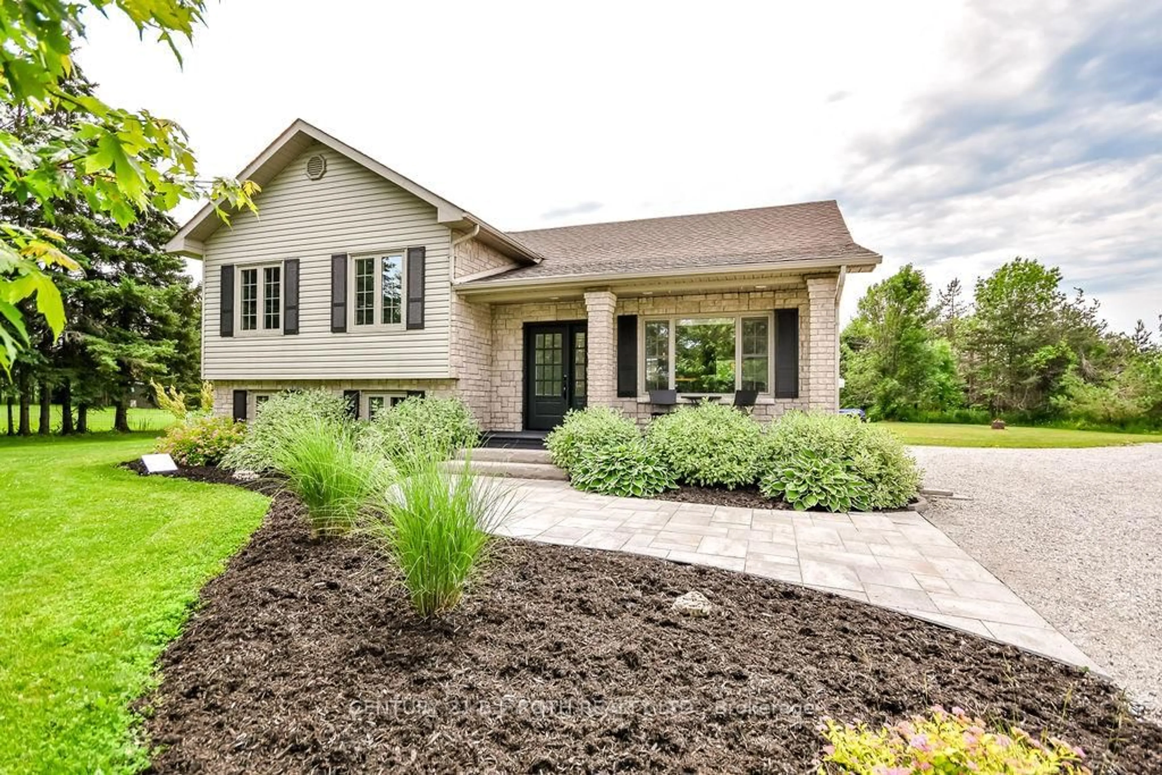 Home with brick exterior material, street for 70 12 Line, Oro-Medonte Ontario L0L 1T0