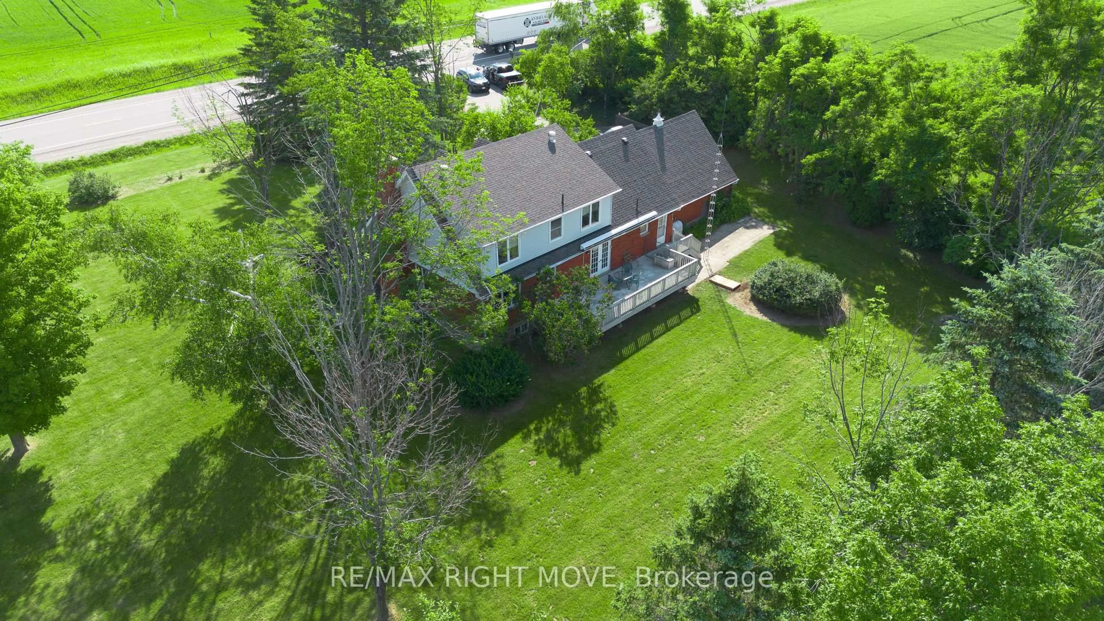 A pic from outside/outdoor area/front of a property/back of a property/a pic from drone, street for 9992 Hwy 12 Highway, Oro-Medonte Ontario L0K 1E0