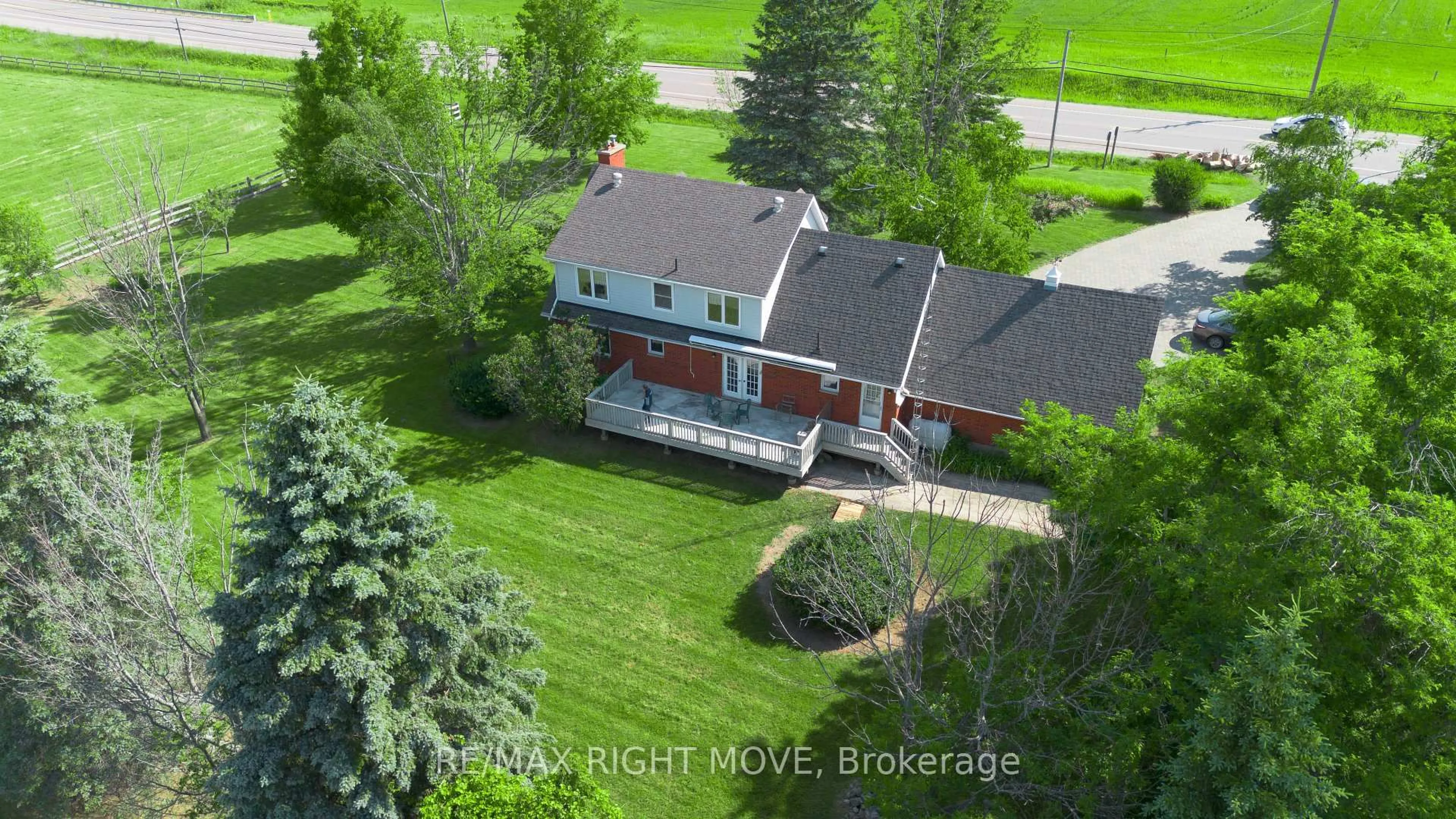 A pic from outside/outdoor area/front of a property/back of a property/a pic from drone, street for 9992 Hwy 12 Highway, Oro-Medonte Ontario L0K 1E0