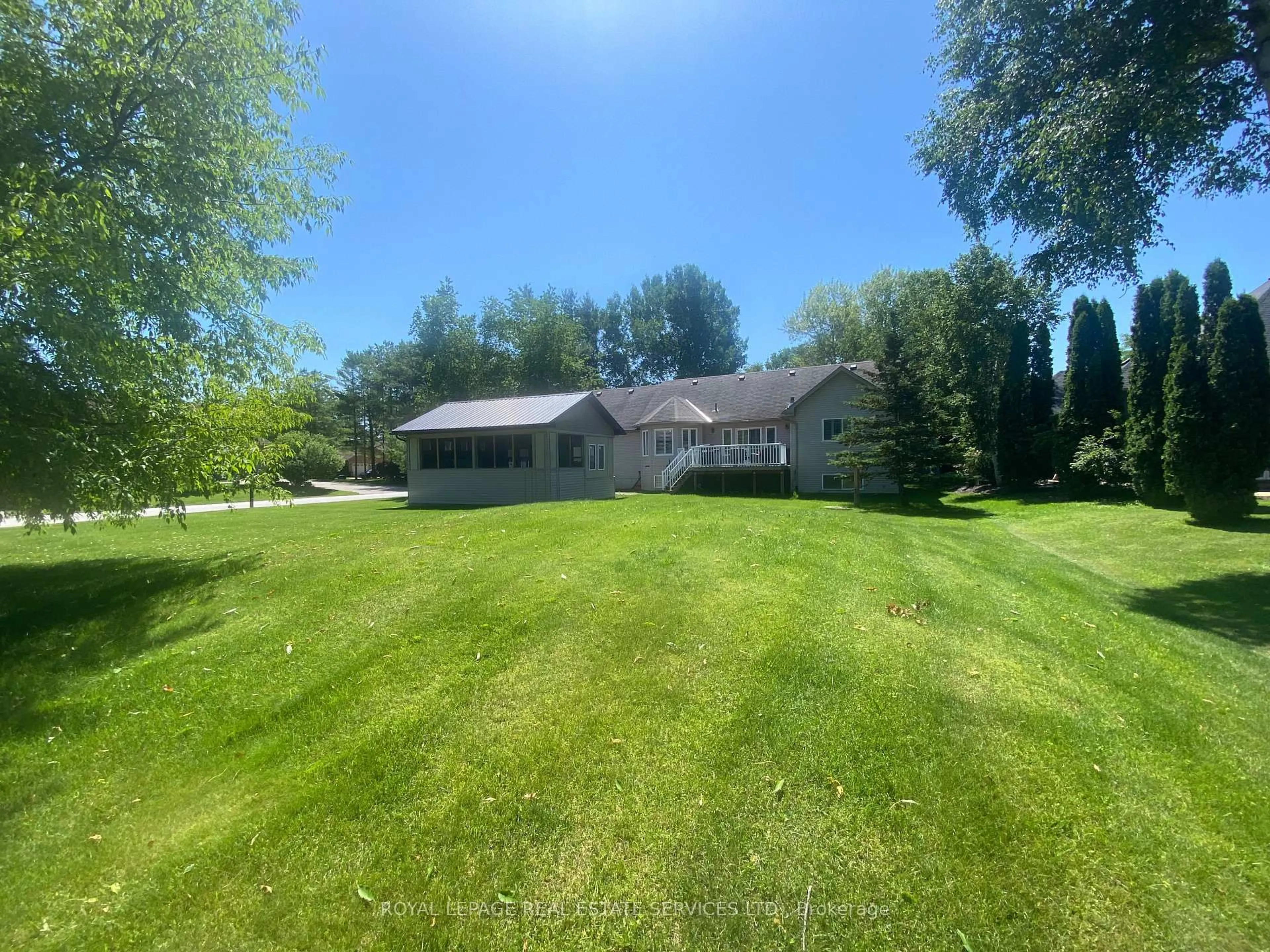 A pic from outside/outdoor area/front of a property/back of a property/a pic from drone, water/lake/river/ocean view for 2 Alexandra Lane, Wasaga Beach Ontario L9Z 1N5