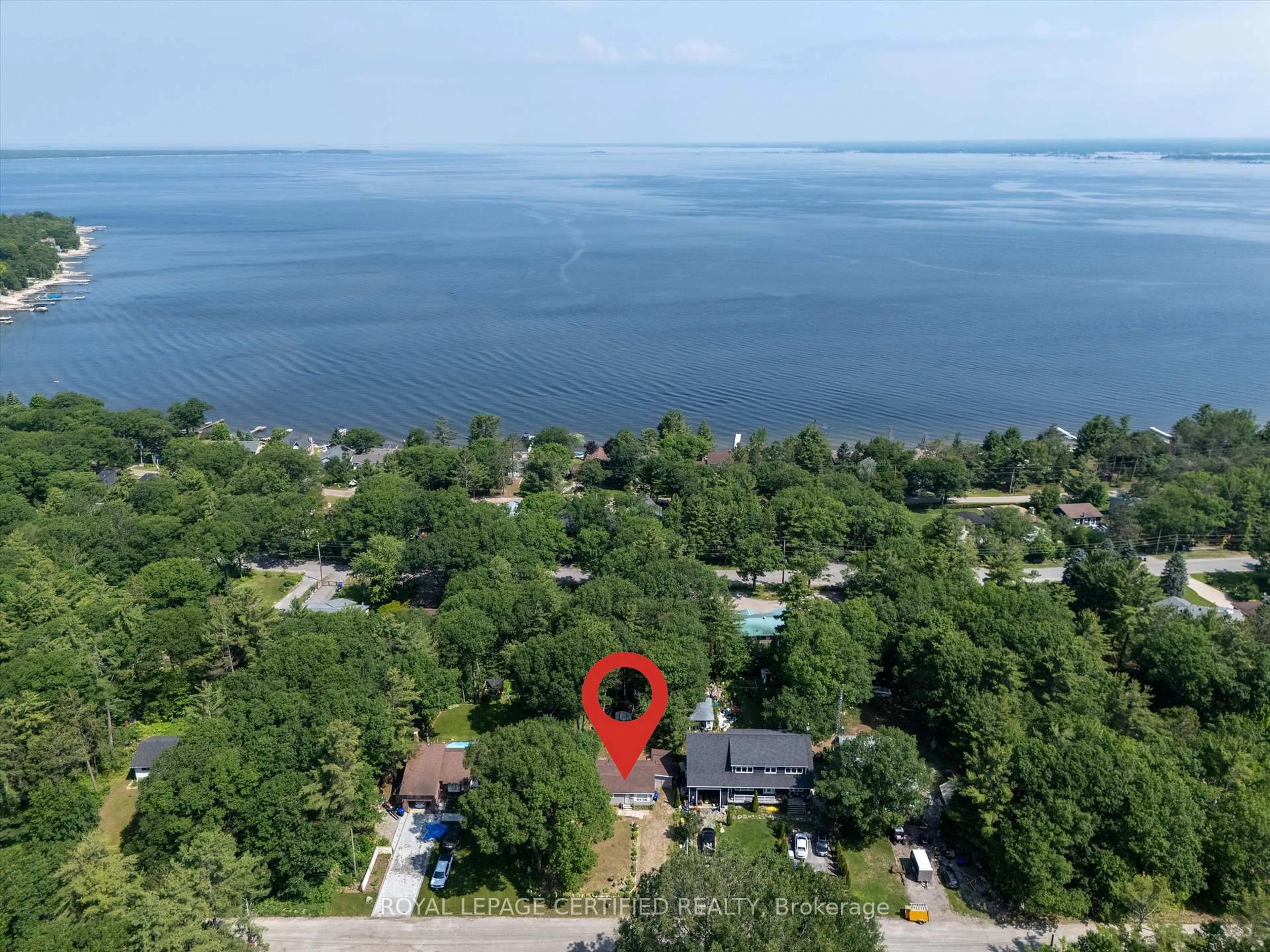 A pic from outside/outdoor area/front of a property/back of a property/a pic from drone, water/lake/river/ocean view for 46 Tucson Rd, Tiny Ontario L9M 0B6
