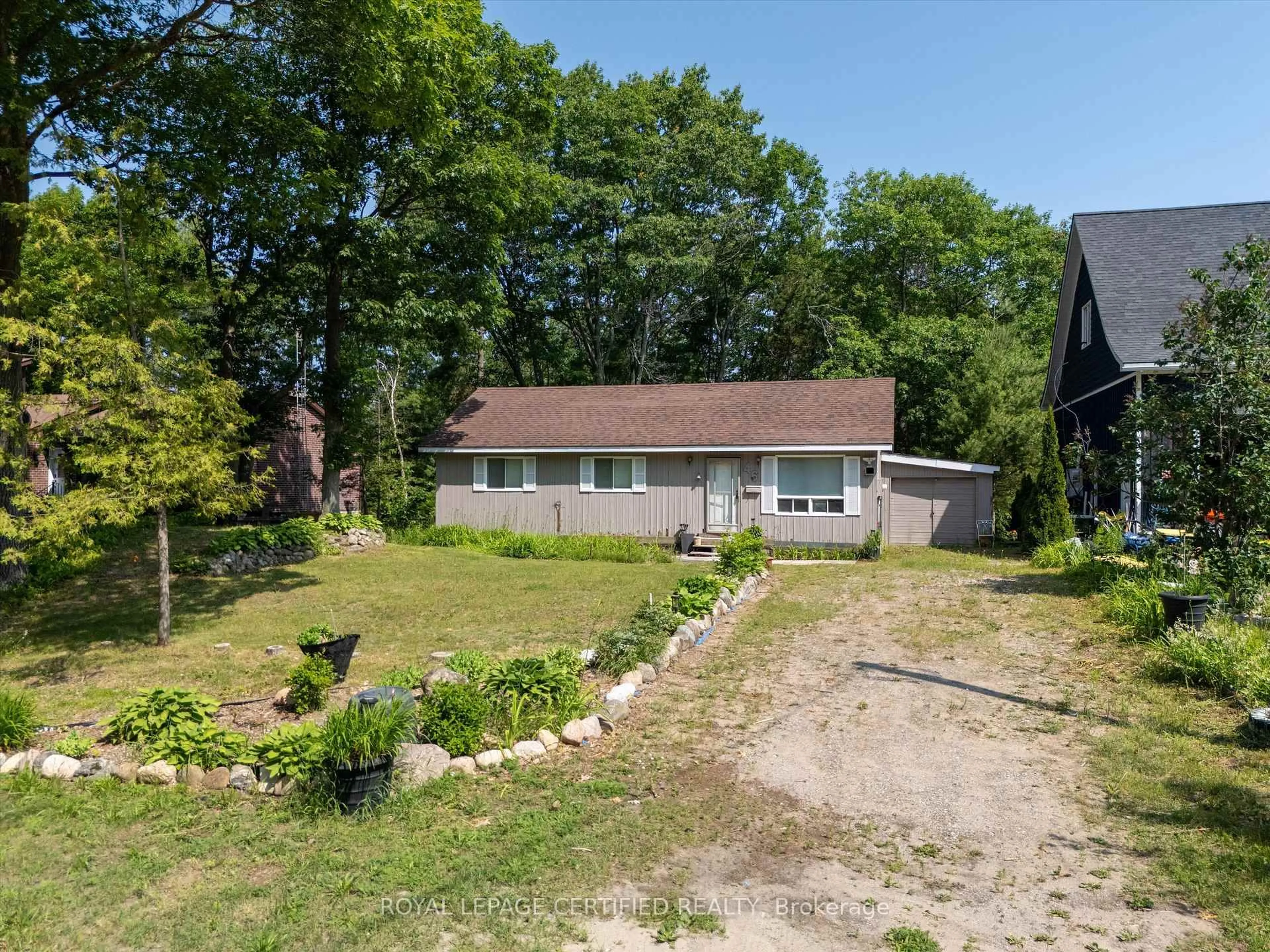 A pic from outside/outdoor area/front of a property/back of a property/a pic from drone, unknown for 46 Tucson Rd, Tiny Ontario L9M 0B6