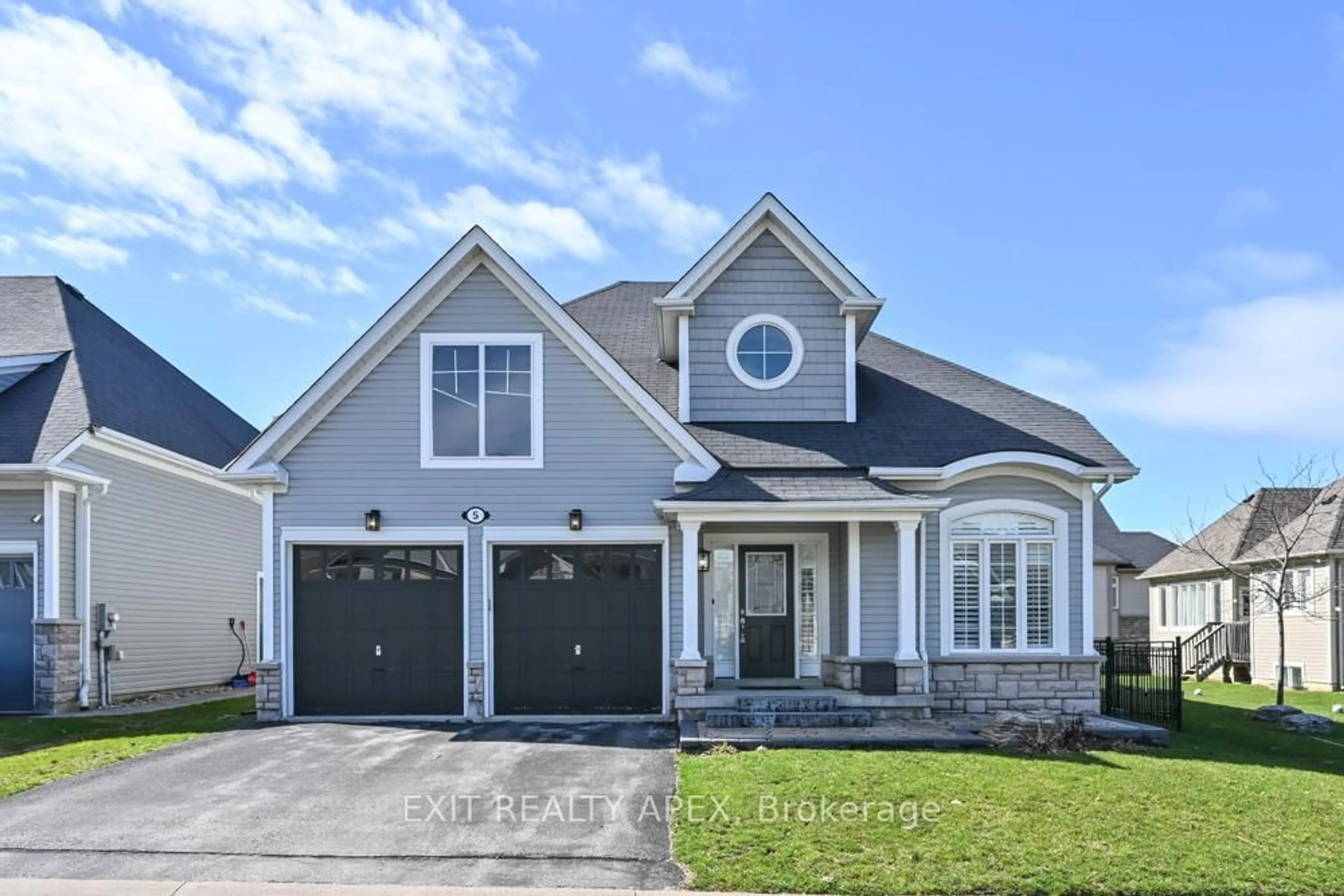 Home with brick exterior material, street for 5 Canoe Road Rd, Wasaga Beach Ontario L9Z 0E9