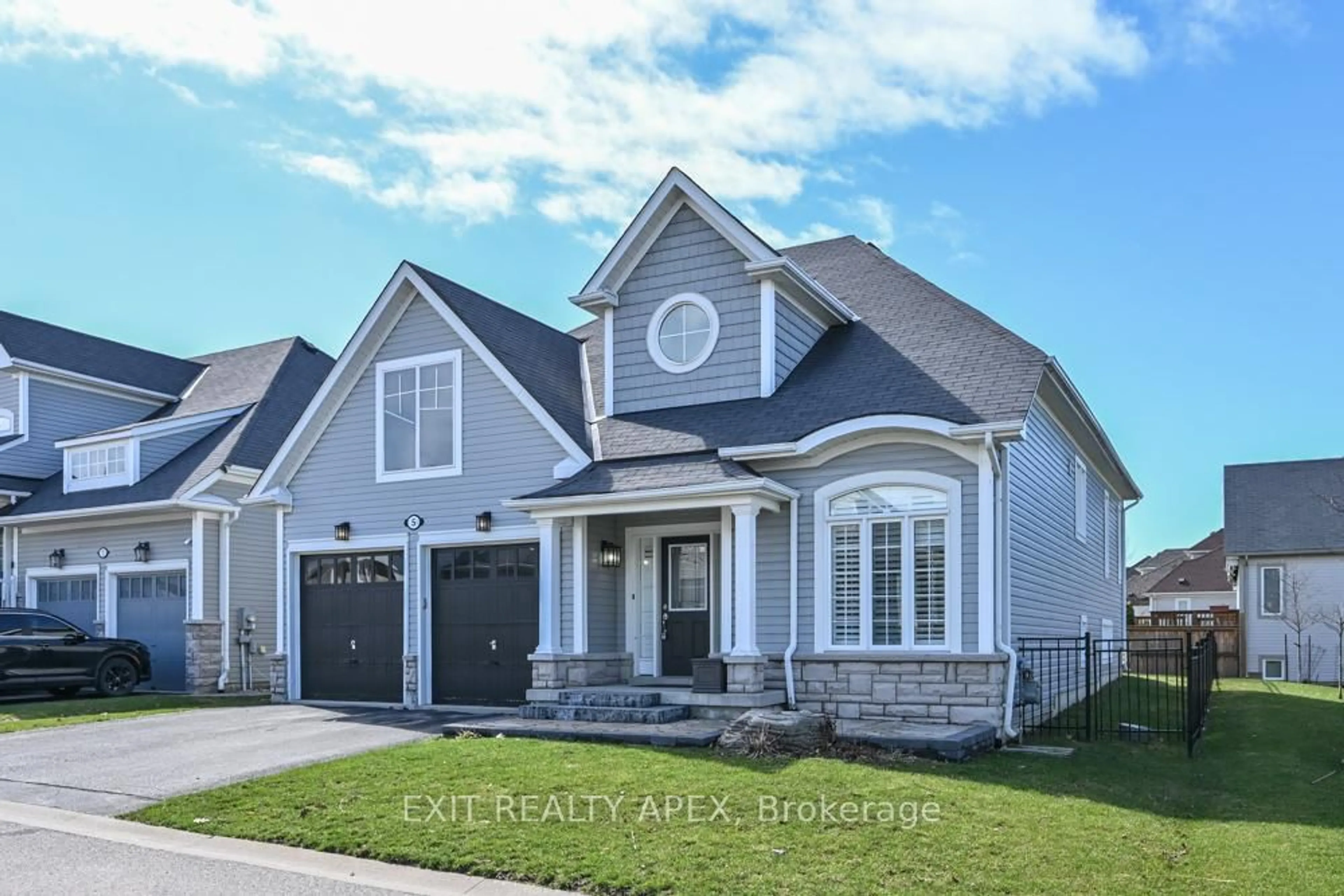 Home with brick exterior material, street for 5 Canoe Road Rd, Wasaga Beach Ontario L9Z 0E9