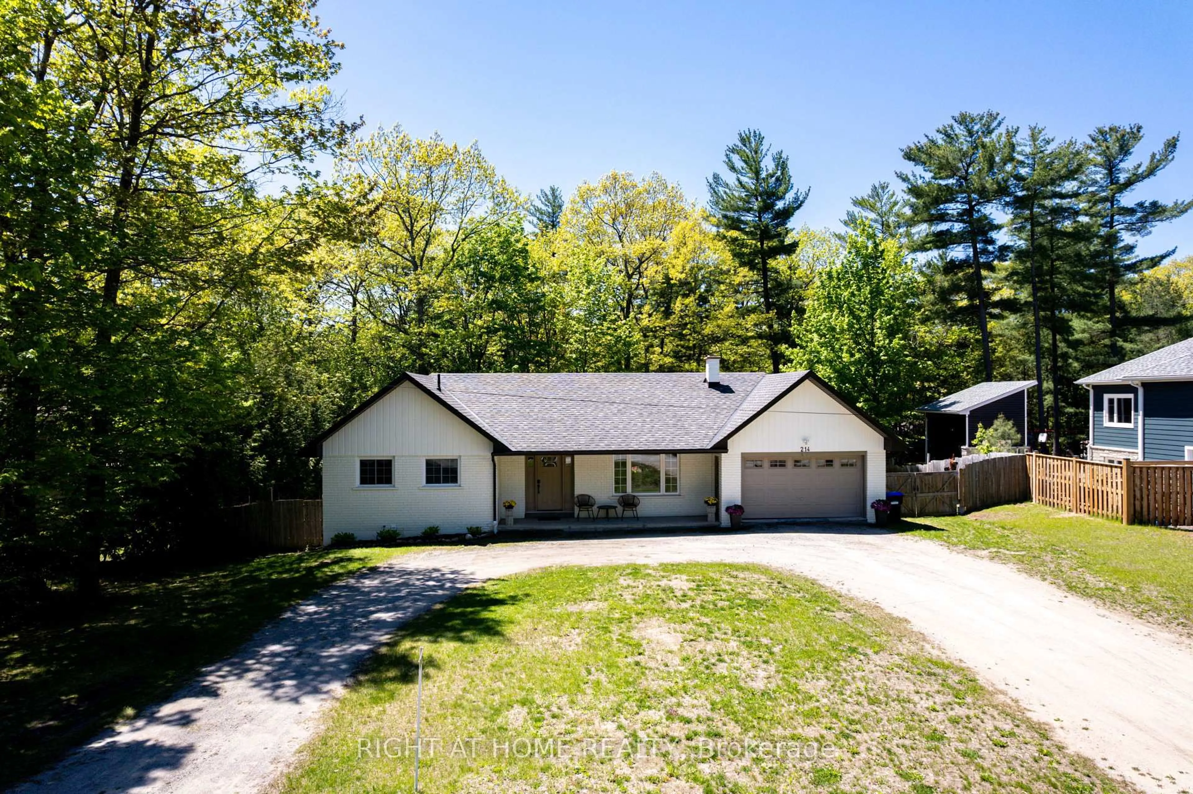 A pic from outside/outdoor area/front of a property/back of a property/a pic from drone, unknown for 214 Desroches Tr, Tiny Ontario L9M 0H9