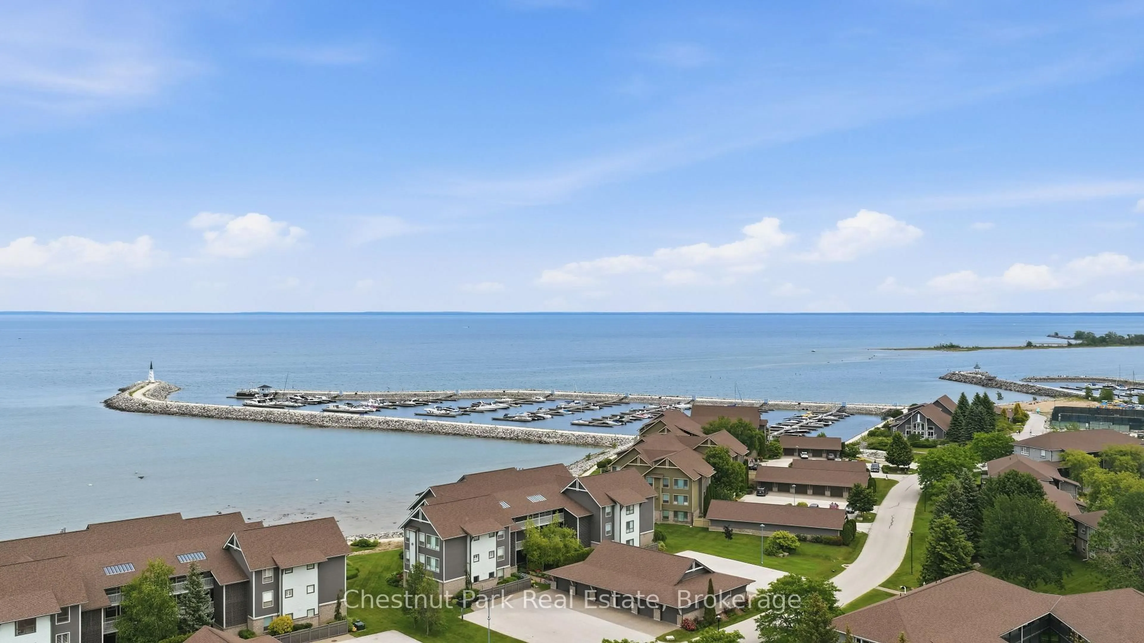 A pic from outside/outdoor area/front of a property/back of a property/a pic from drone, water/lake/river/ocean view for 504 Mariners Way, Collingwood Ontario L9Y 5C7