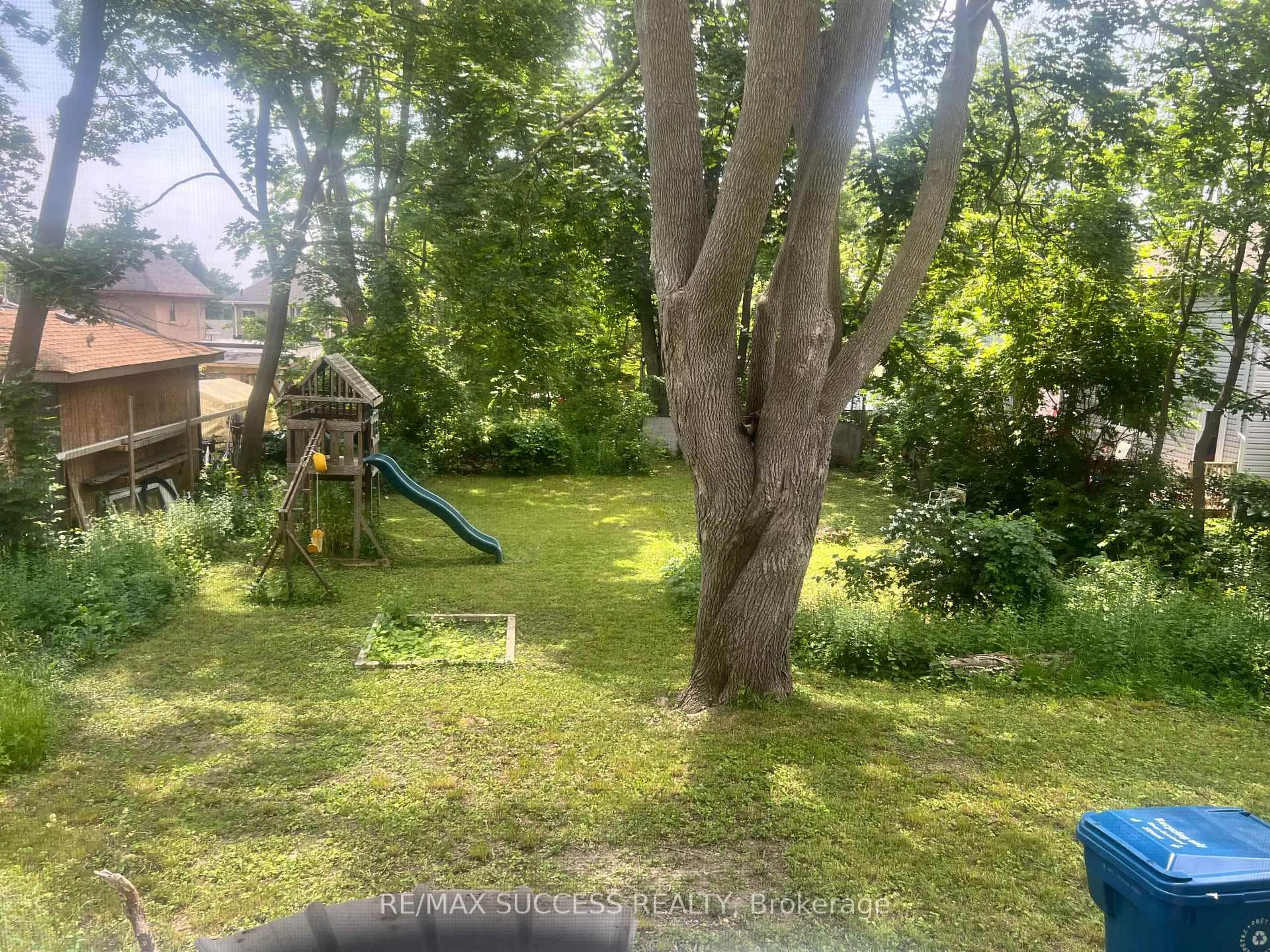 A pic from outside/outdoor area/front of a property/back of a property/a pic from drone, forest/trees view for 243 Harvey St, Orillia Ontario L3V 3M5